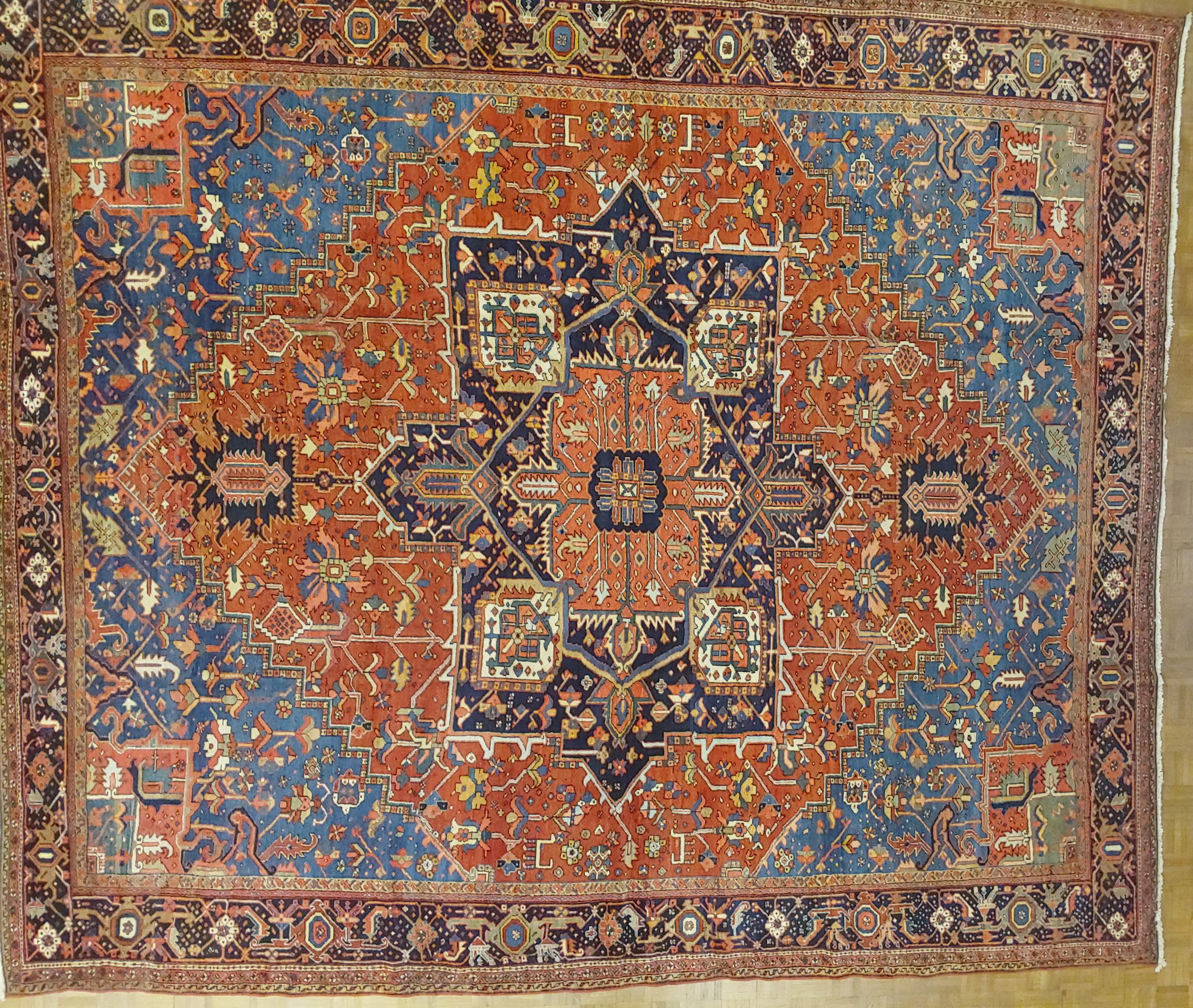 Antique Persian Heriz Rug, Rust with Blue and Teal Corners, Wool, 1915 For Sale 3