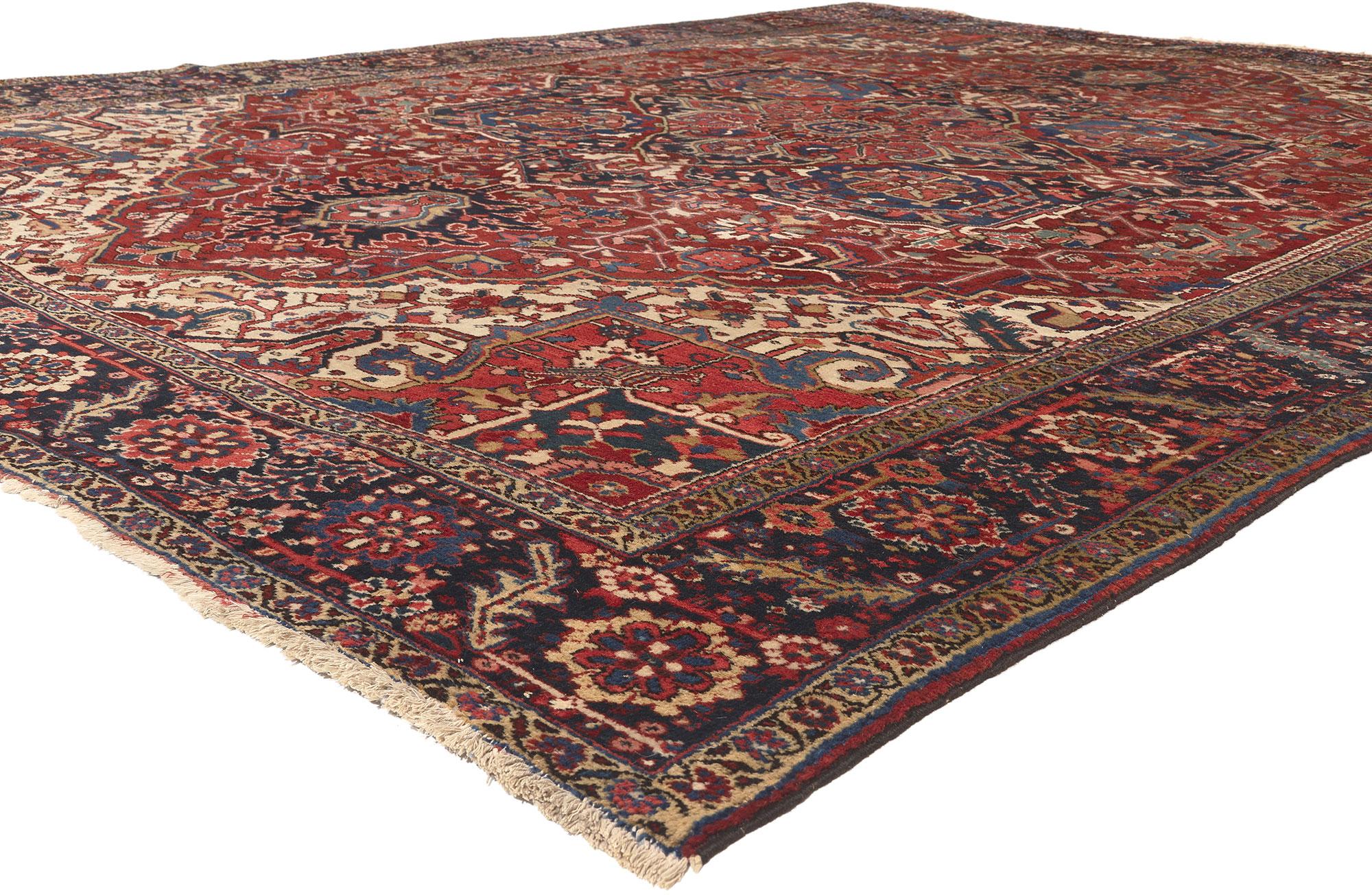 78633 Antique Persian Heriz Rug, 10'05 x 13'08.
Stylish durability meets patriotic panache in this hand knotted wool antique Persian Heriz rug. The intrinsic geometric design and traditional color palette woven into this piece work together creating