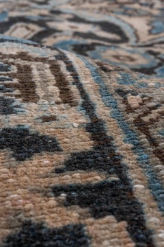 Antique Persian Heriz Rug with a Caramel Beige Field, Blue Ahar Medallion