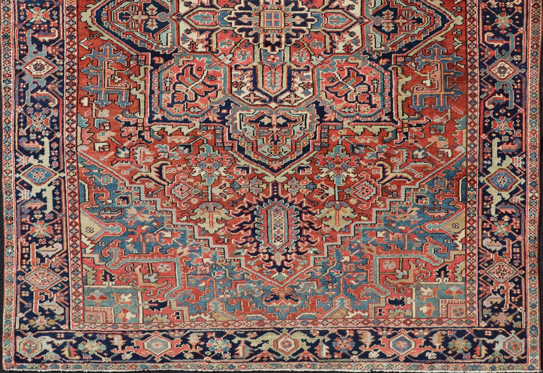 Hand Knotted Persian Antique Heriz Rug with medallion design in jewel colors,
Keivan Woven Arts / rug EMB-9586-P13505, country of origin / type: Persian / Heriz, circa Early-20th Century.

Measures: 7'6 x 10'9.