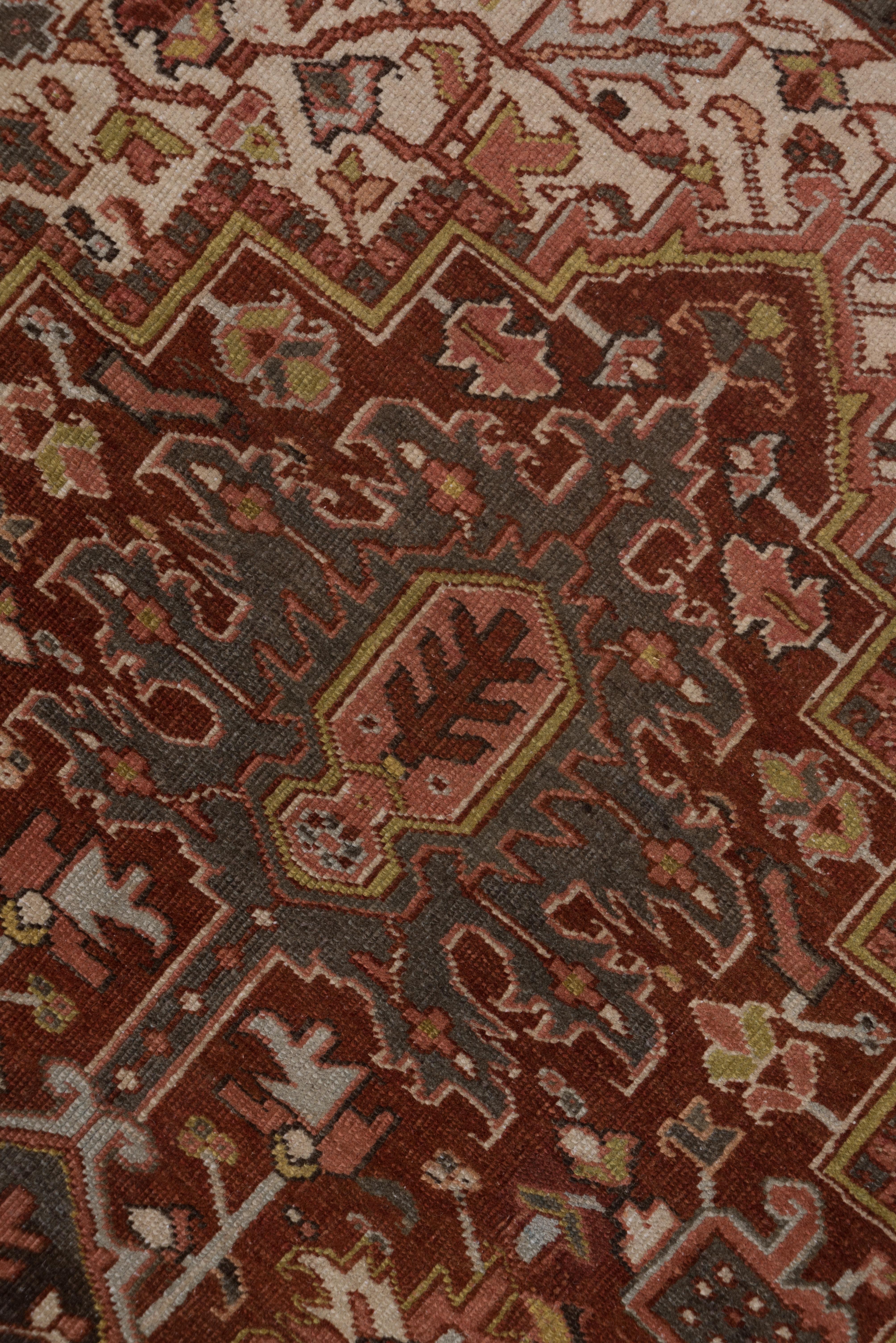 Hand-Knotted Antique Persian Heriz Rug with Dark & Colorful Tones, Circa 1930s For Sale