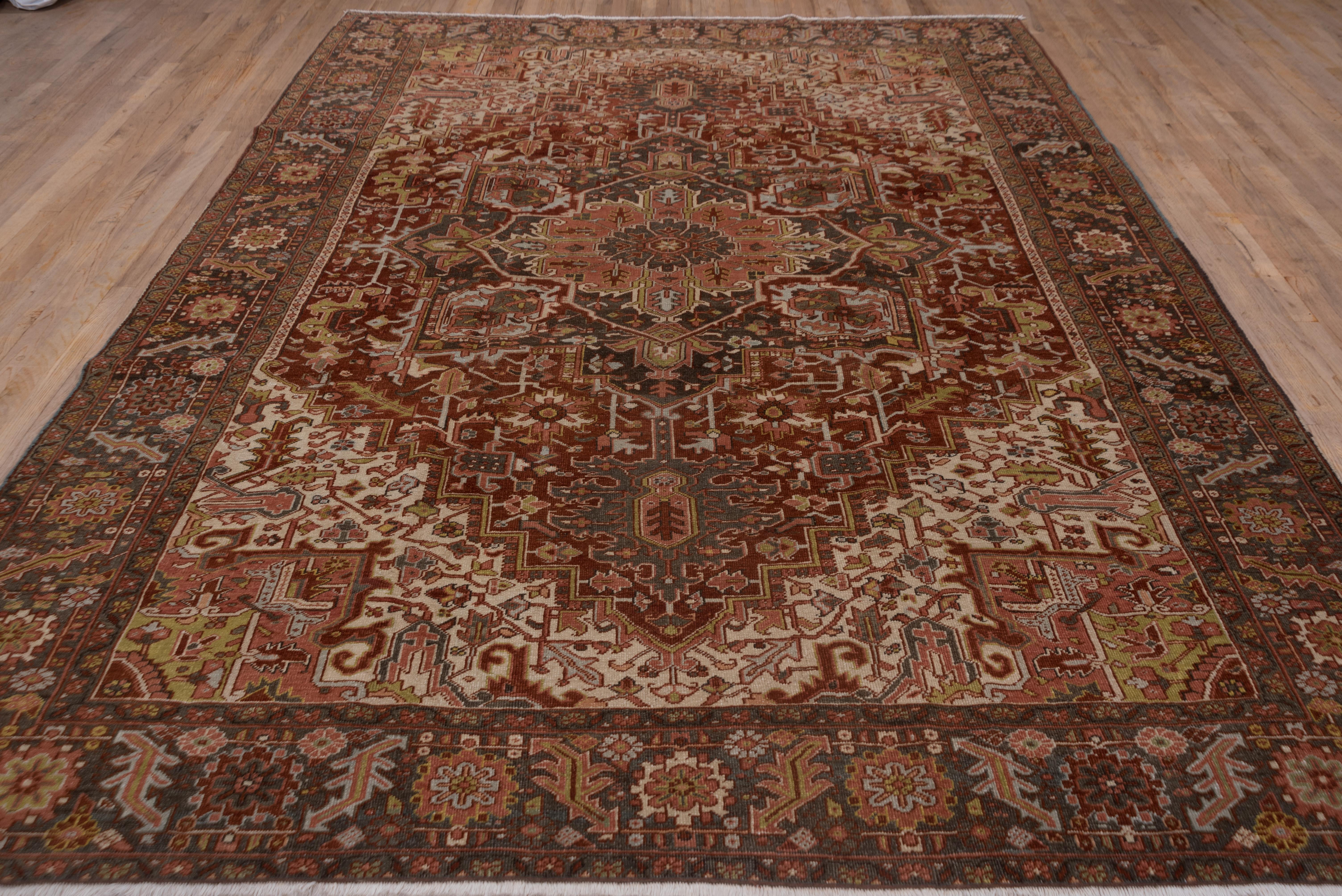 Antique Persian Heriz Rug with Dark & Colorful Tones, Circa 1930s In Good Condition For Sale In New York, NY