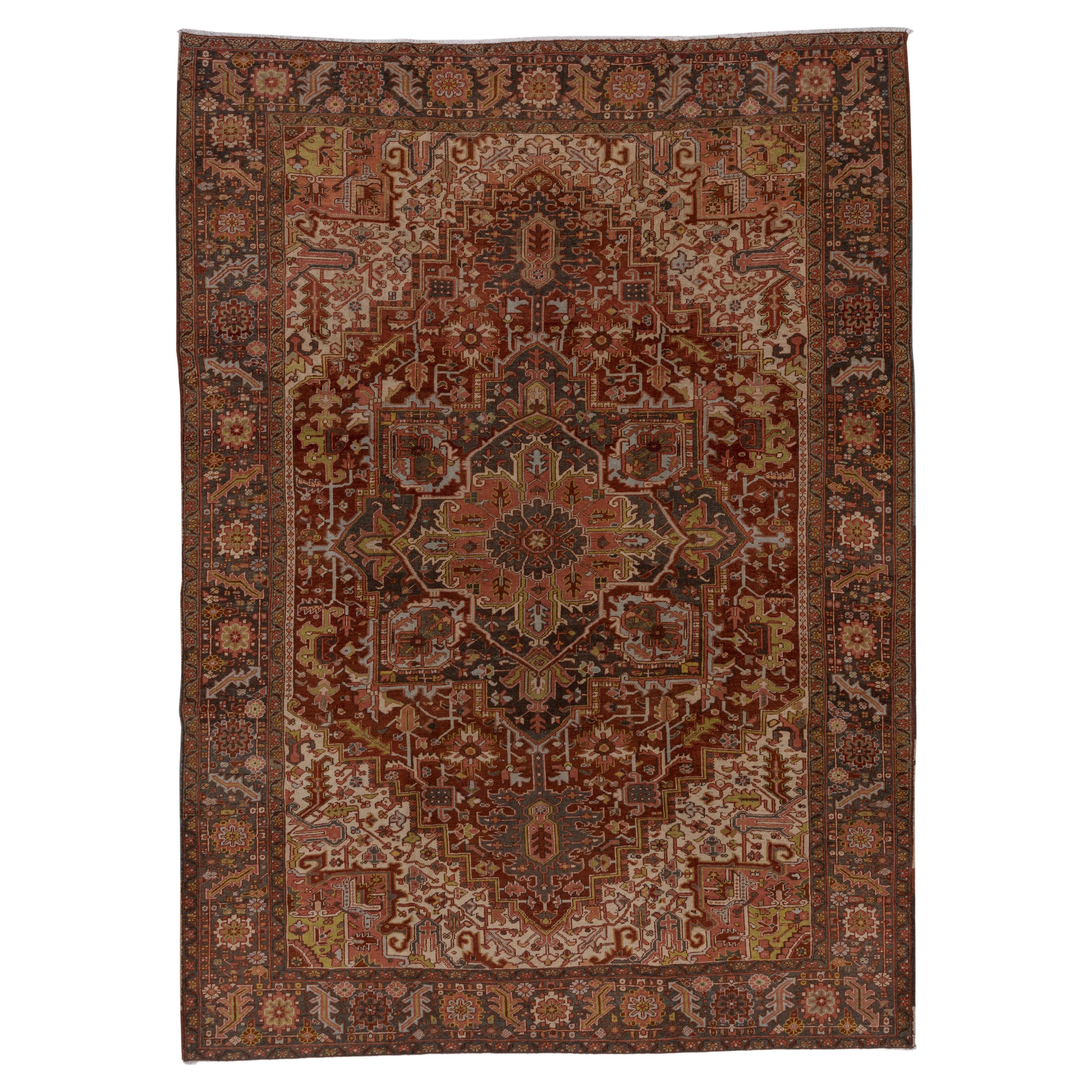 Antique Persian Heriz Rug with Dark & Colorful Tones, Circa 1930s