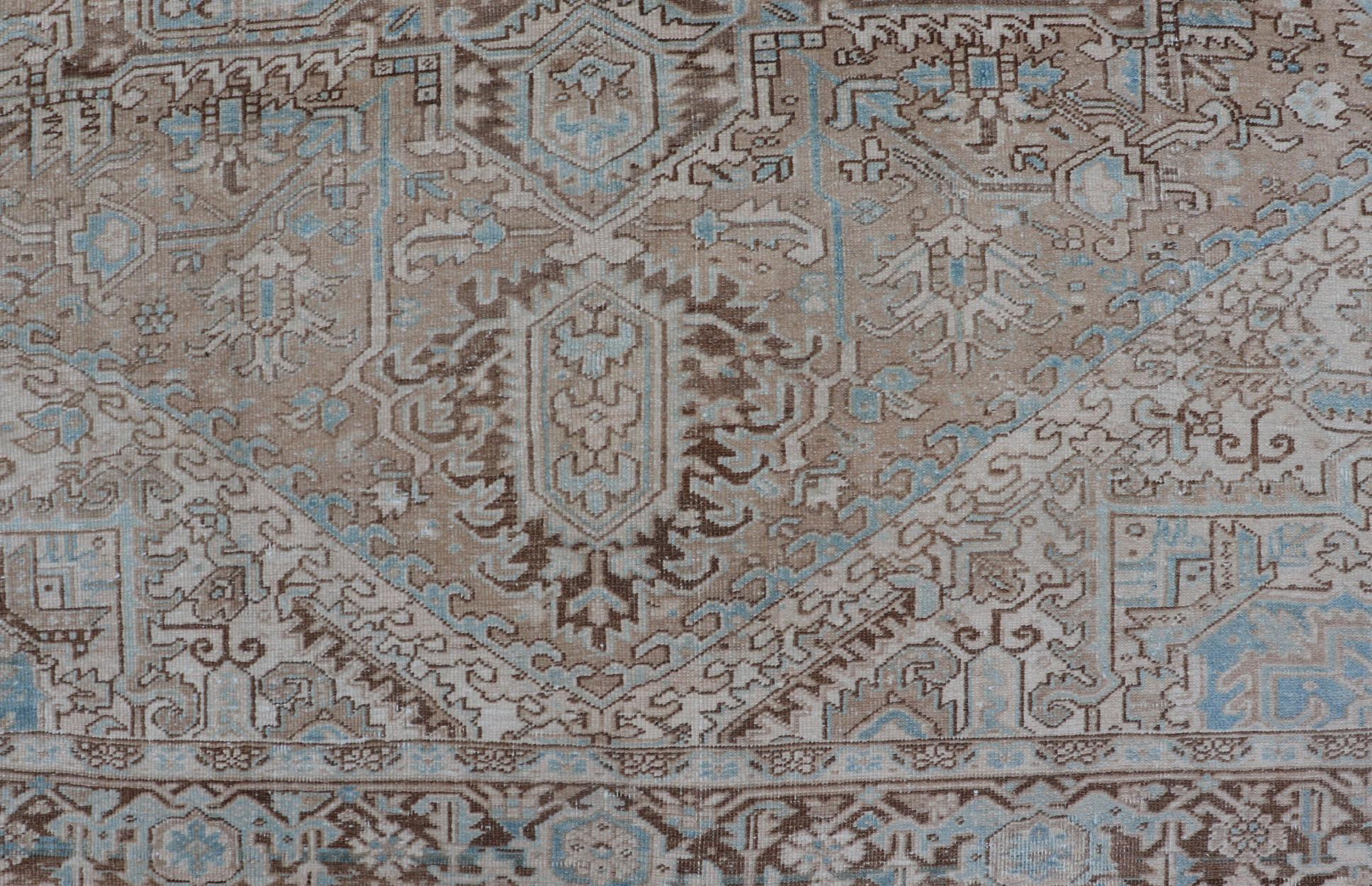 Intricately designed geometric Persian Heriz carpet in earth tones, rug EMB-9539-P13038, country of origin / type: Iran / Heriz, circa 1930

This magnificent vintage Persian Heriz carpet from the mid-20th century (circa 1930) bears an exquisite