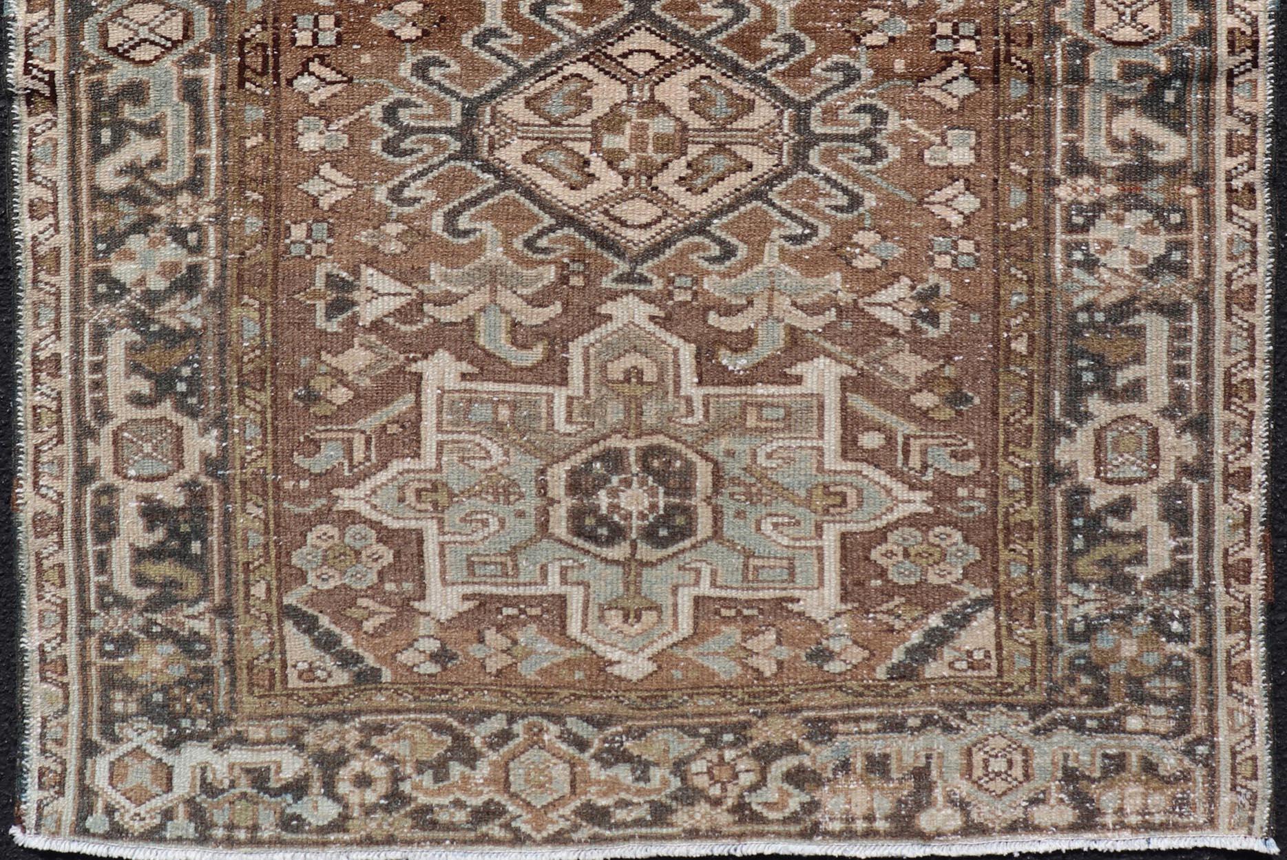 20th Century Antique Persian Heriz Rug with Geometric Medallion Design in Mocha, Blue, & Tan For Sale