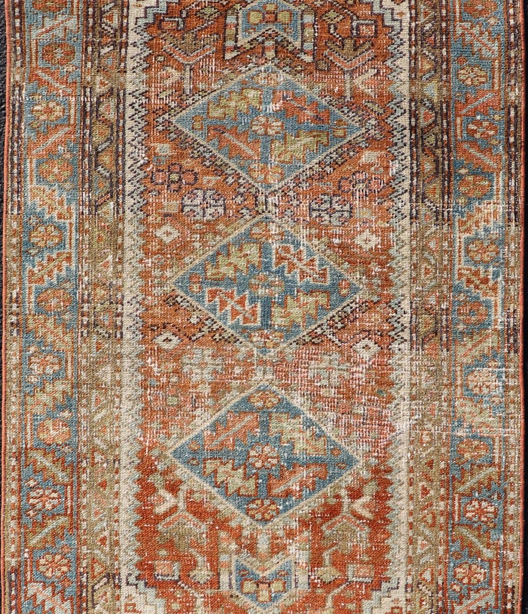 Hand-Knotted Antique Persian Heriz Rug with Geometric Medallion Design in Red, Olive, Blue For Sale