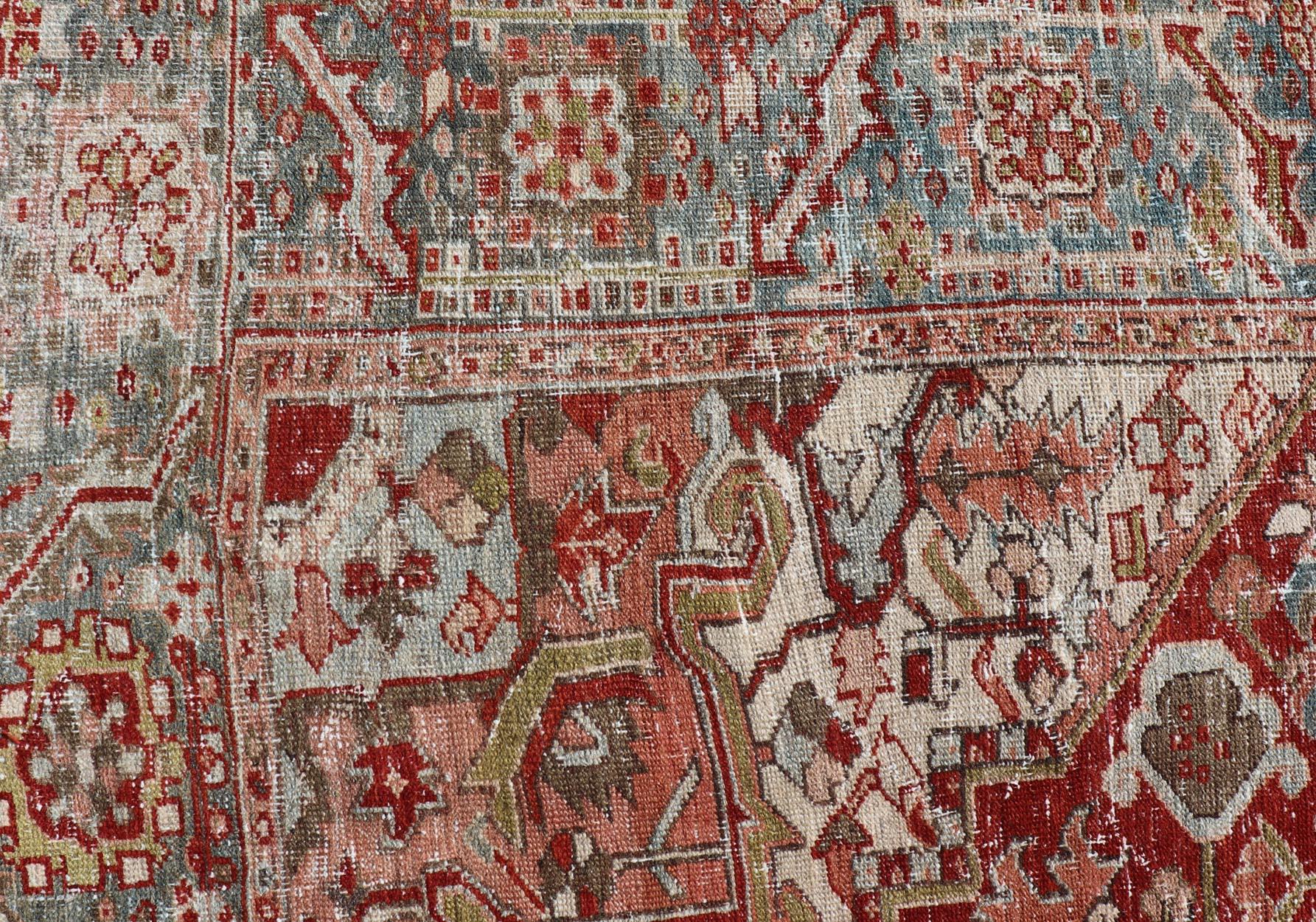  Antique Persian Heriz Rug With Geometric Medallion Design in Red & Soft Colors. Antique Persian Heriz Rug with Geometric Medallion Design. Keivan Woven Arts/ Rug/ EMB-22193-15100, Country/type/ Persian Rug, Heriz. 

     Measures: 6'10 x 9'6

Made