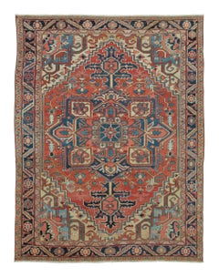 Tapis persan Heriz ancien avec médaillon géométrique rouge et bleu - Rug & Kilim