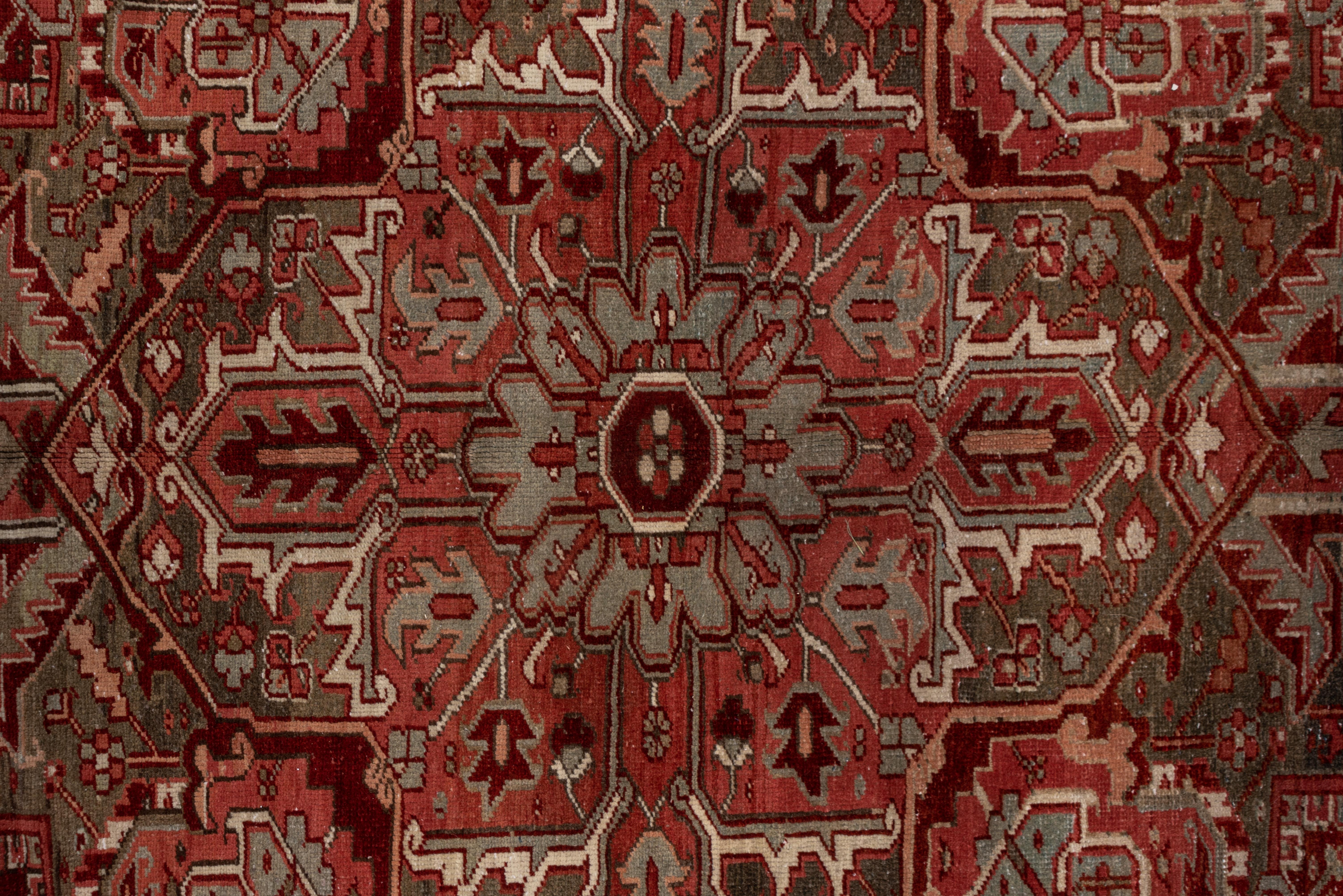 Antique Persian Heriz Rug, with Red, Olive Green & Coral Tones, circa 1930s In Good Condition For Sale In New York, NY