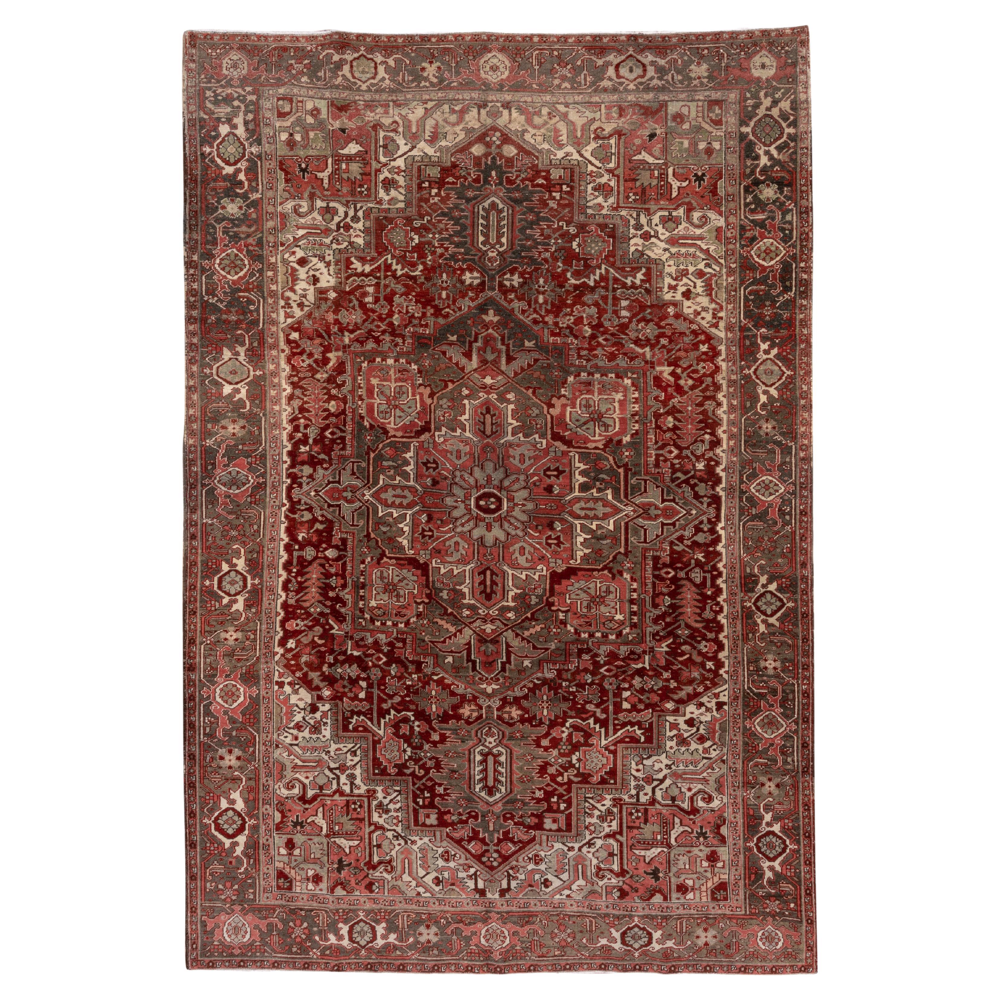 Antique Persian Heriz Rug, with Red, Olive Green & Coral Tones, circa 1930s For Sale