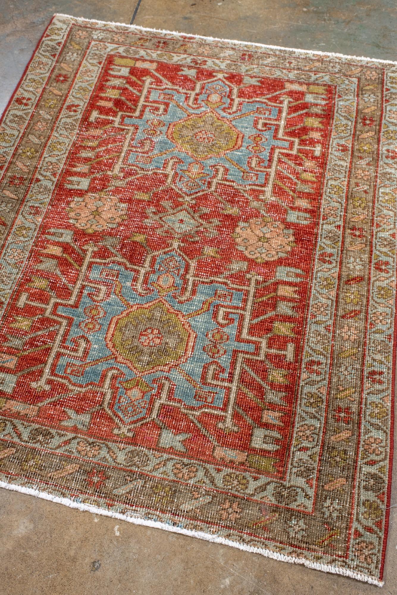 Persiano Antique Persian Heriz Rug with Soft Sky Blue & Brick Red Medallions in vendita
