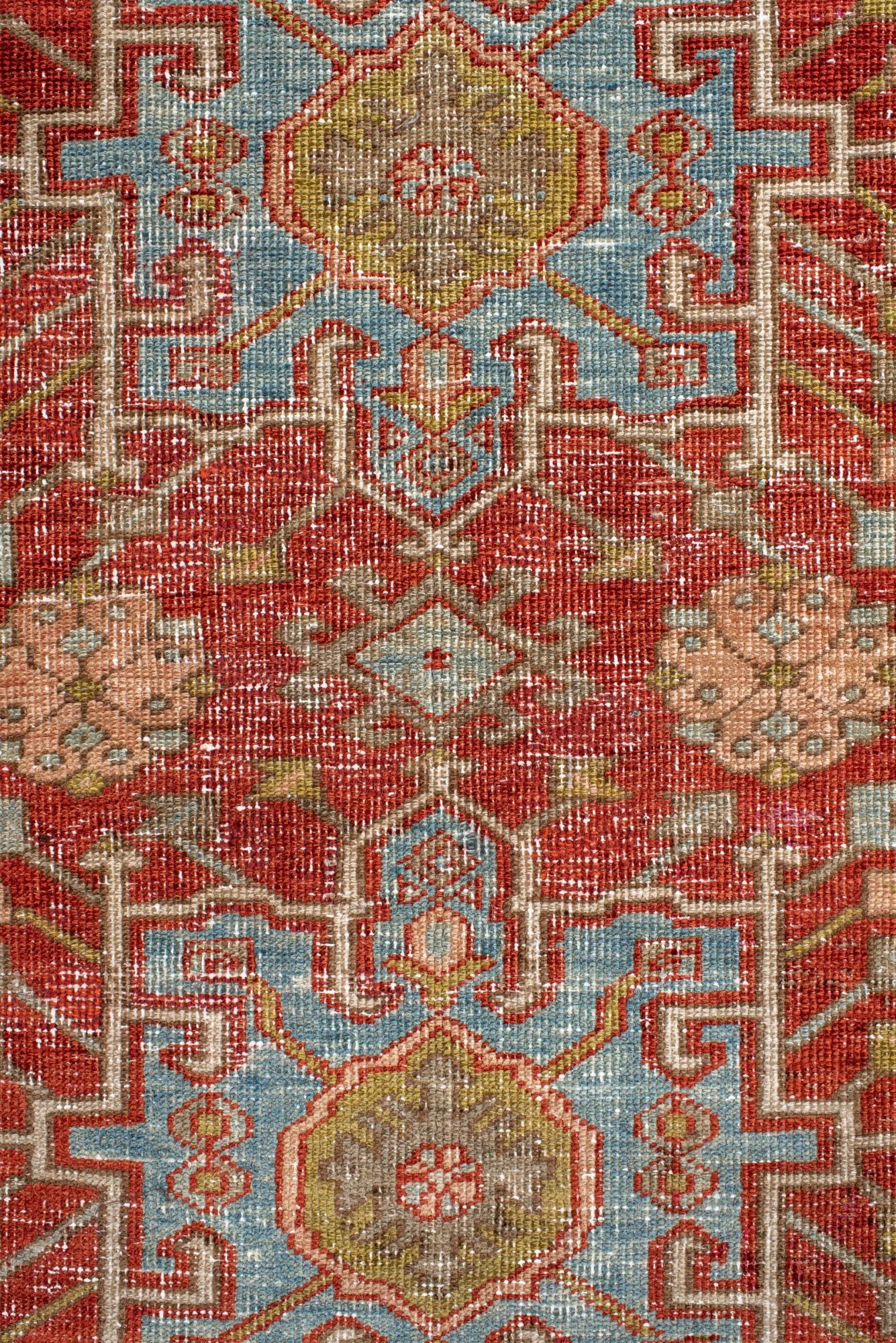 Annodato a mano Antique Persian Heriz Rug with Soft Sky Blue & Brick Red Medallions in vendita
