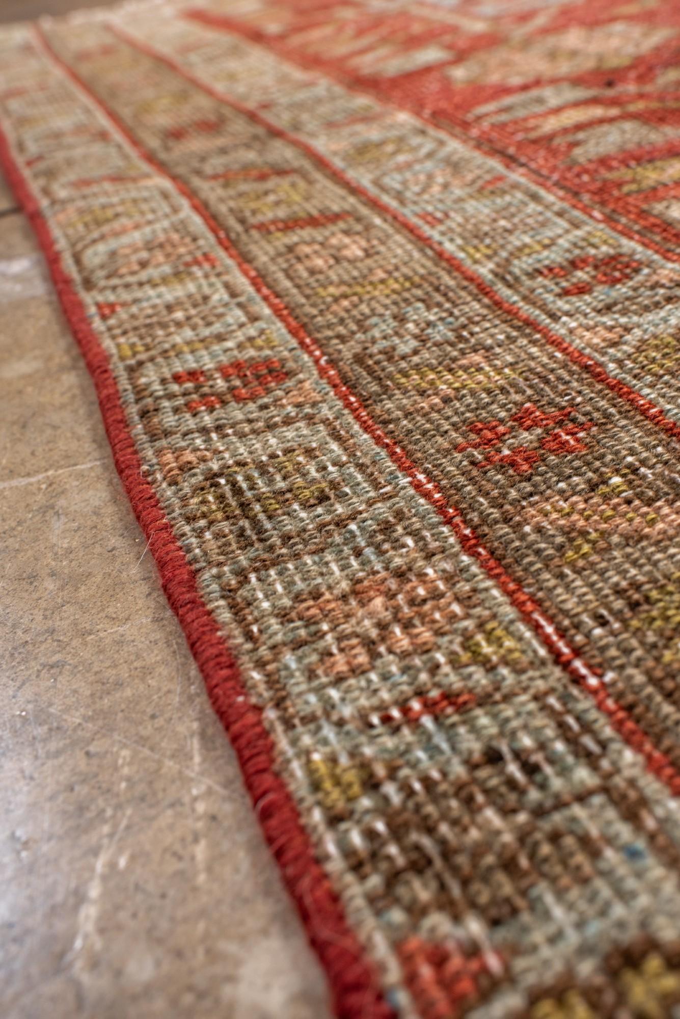 XX secolo Antique Persian Heriz Rug with Soft Sky Blue & Brick Red Medallions in vendita