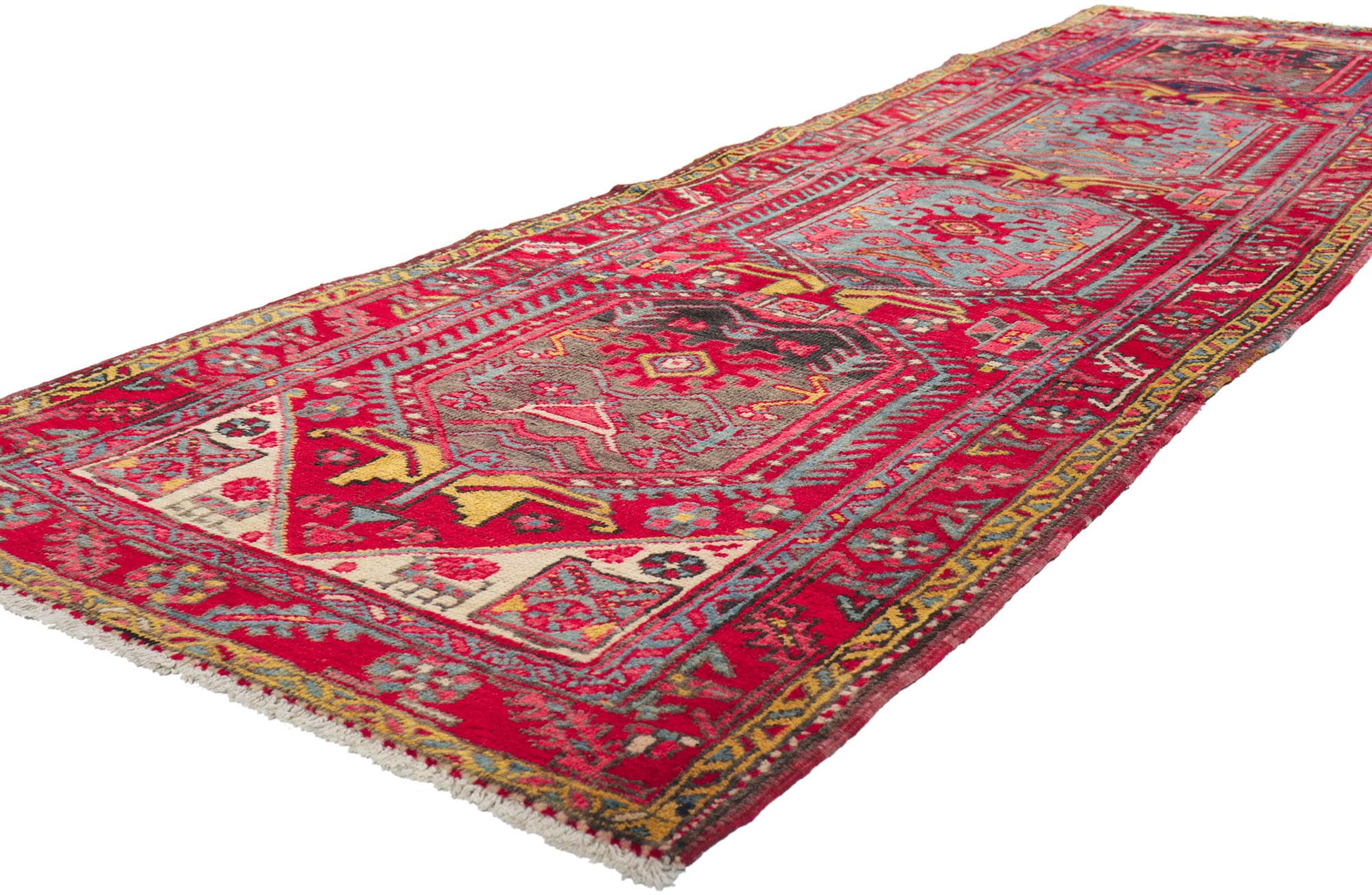 61223 Antique Persian Heriz Runner, 03'00 x 10'05.
Full of tiny details and nomadic charm, this hand knotted wool antique Persian Heriz runner is a captivating vision of woven beauty. The eye-catching tribal design and energetic colorway woven into