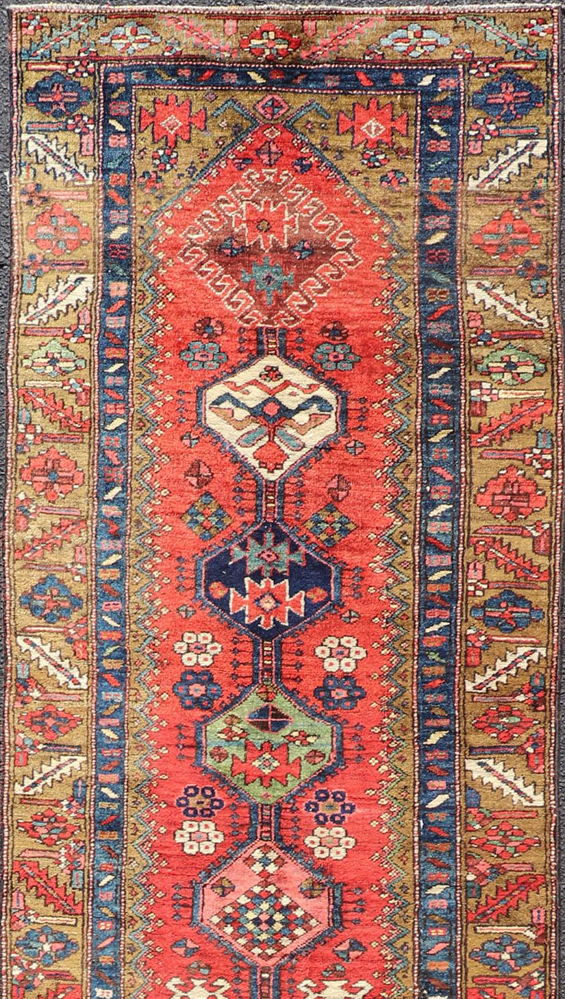 Heriz Serapi Antique Persian Heriz Runner in Reds, Blues, Pink, Ivory and Earthy Tones For Sale