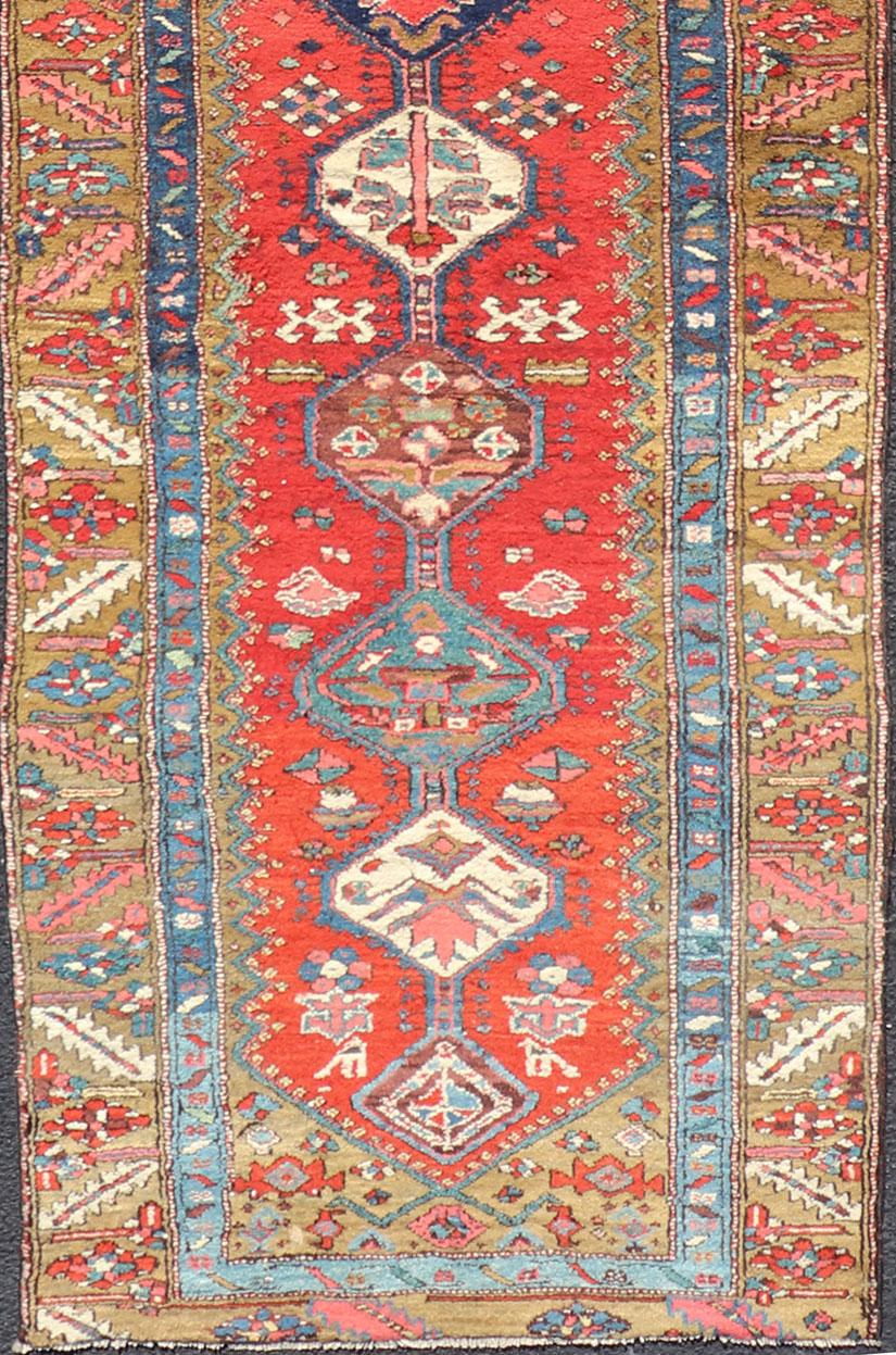 Antique Persian Heriz Runner in Reds, Blues, Pink, Ivory and Earthy Tones In Good Condition For Sale In Atlanta, GA