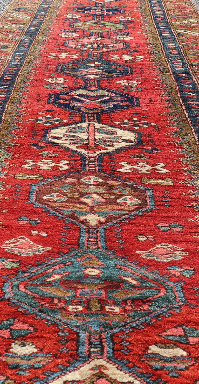 Antique Persian Heriz Runner in Reds, Blues, Pink, Ivory and Earthy Tones For Sale 1
