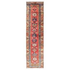 Antique Persian Heriz Runner in Reds, Blues, Pink, Ivory and Earthy Tones