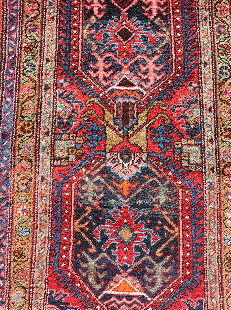 Persian Antique Heriz runner with All-Over Sub-Geometric Medallion Design. Keivan Woven Arts / rug W22-1204, country of origin / type: Persian / Heriz, circa Early-20th Century.

Measures: 2'11 x 10'5 

This Antique Persian Heriz runner features