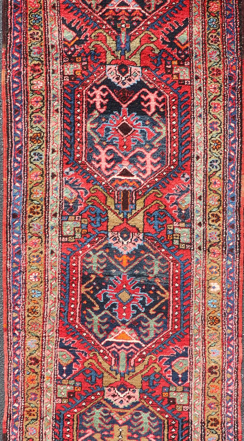 20th Century Antique Persian Heriz Runner with All-Over Sub-Geometric Medallion Design For Sale