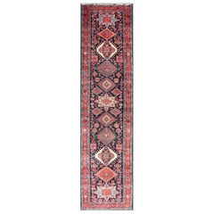 Antique Persian Heriz Runner with Bold Geometric Medallions and Tribal Design