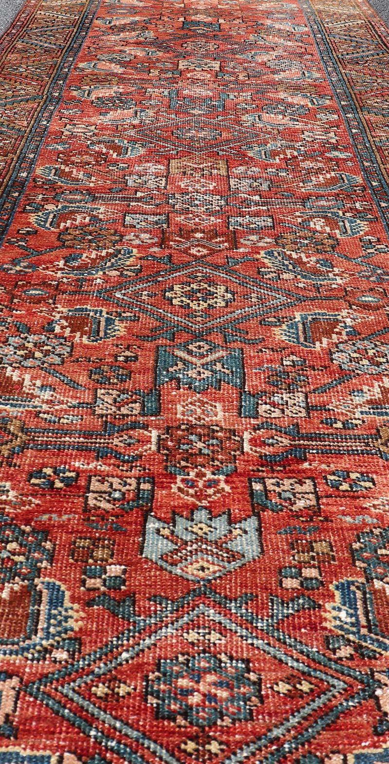 Antique Persian Heriz Runner with Colorful All-Over Stylized Floral Design. Keivan Woven Arts /  rug EMB-22130-15019, origin/iran Early 20th Century Heriz Runner. 
Measures: 2'11 x 10'9 
This magnificent Heriz runner from the early 20th century