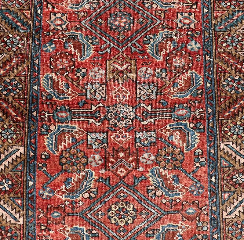Heriz Serapi Antique Persian Heriz Runner with Colorful All-Over Stylized Floral Design For Sale