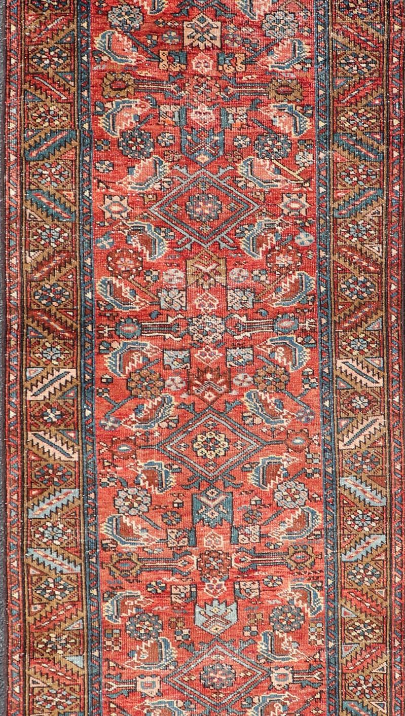 20th Century Antique Persian Heriz Runner with Colorful All-Over Stylized Floral Design For Sale