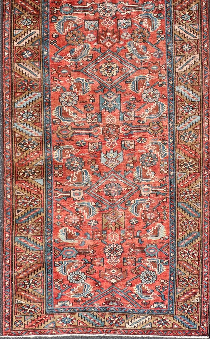 Wool Antique Persian Heriz Runner with Colorful All-Over Stylized Floral Design For Sale
