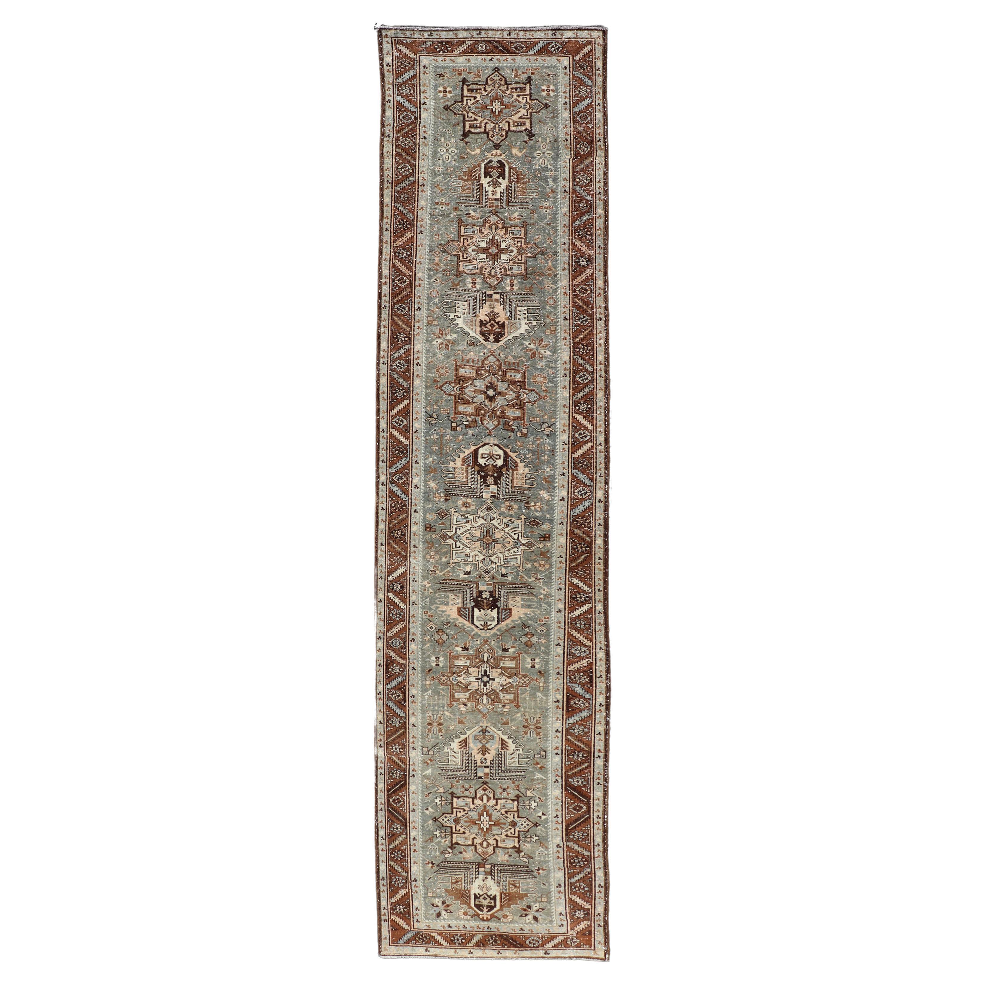 Antique Persian Heriz Runner with Geometric Medallions For Sale