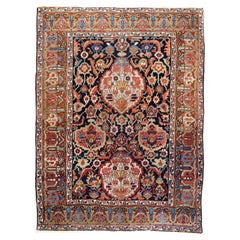 Tapis persan antique Heriz Serapi 4'10" x 6'5" (en anglais)