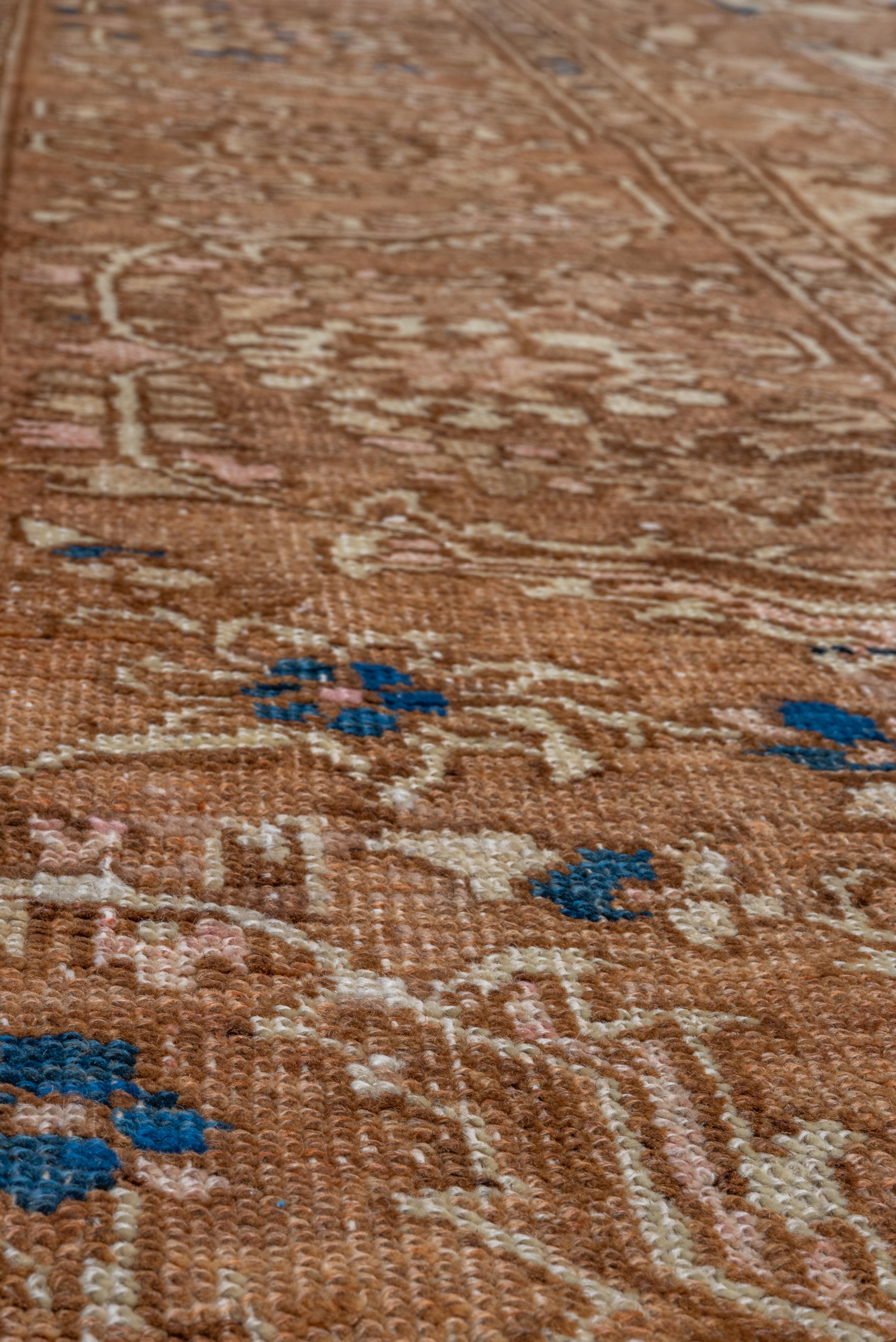 Hand-Knotted Antique Persian Heriz Serapi Rug, Tan Field with Blue & Pink Accents, Circa 1910 For Sale