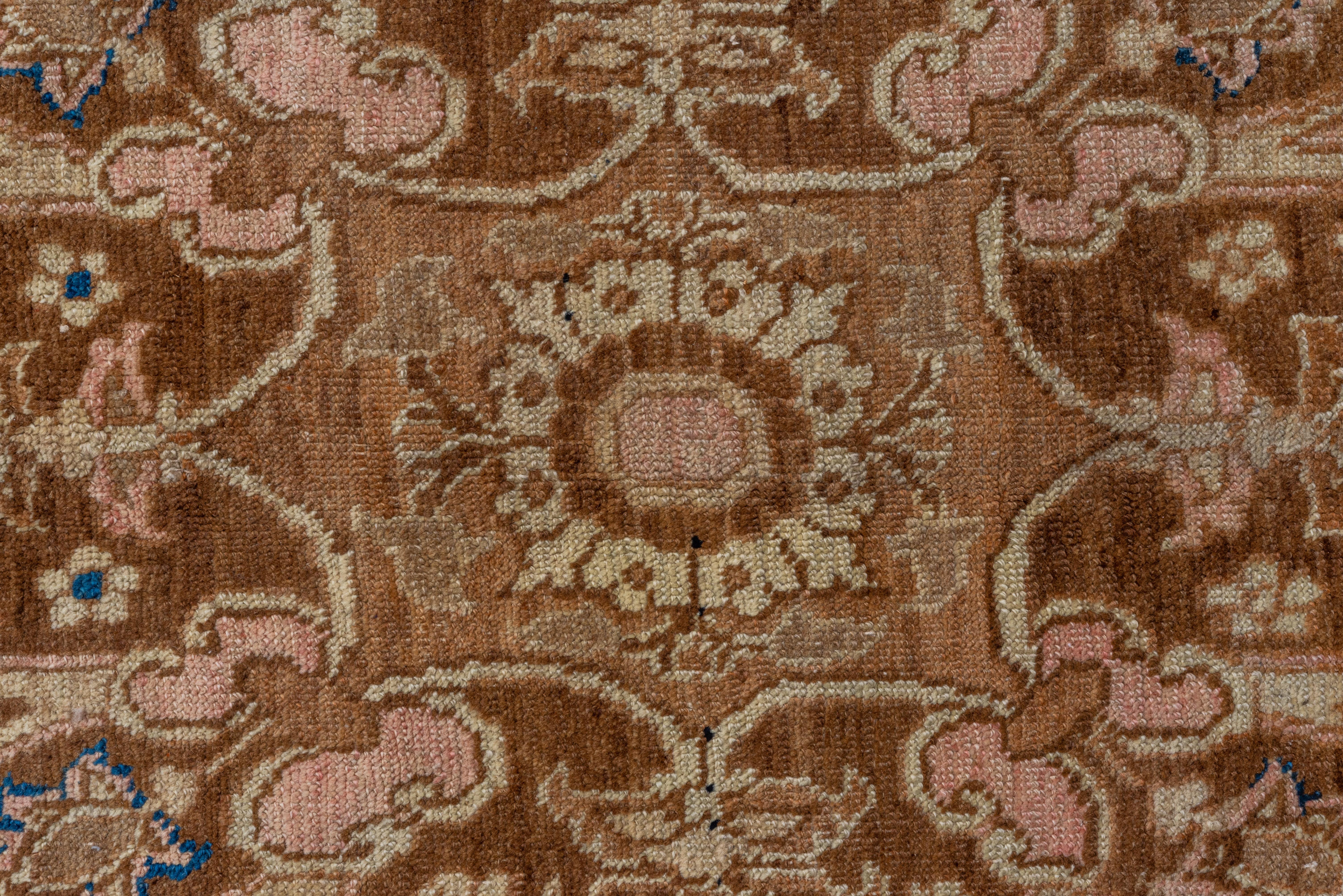 Early 20th Century Antique Persian Heriz Serapi Rug, Tan Field with Blue & Pink Accents, Circa 1910 For Sale