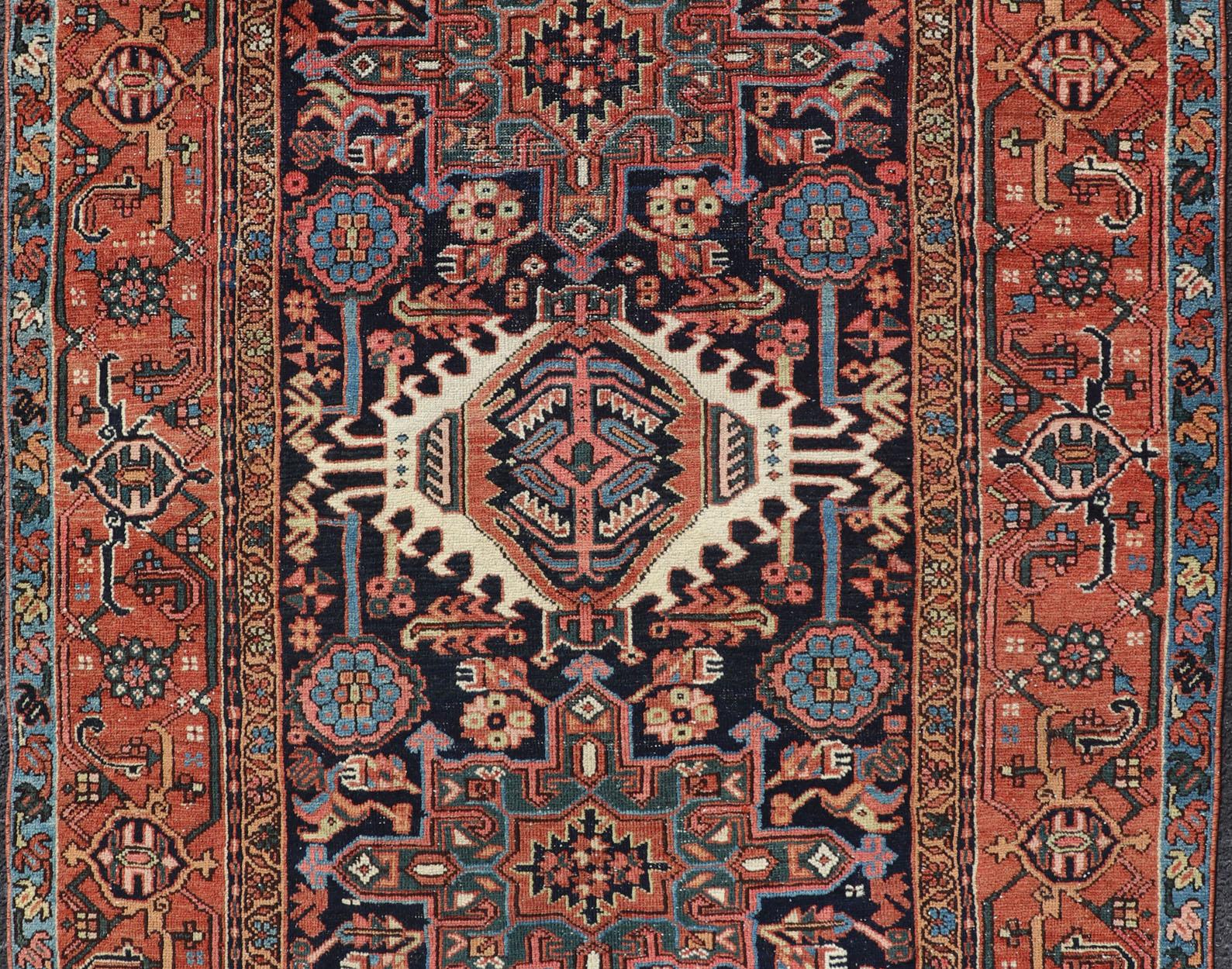 Hand-Knotted Antique Persian Heriz with Medallion Design in Ivory, Dark Blue & Jewel Tones For Sale