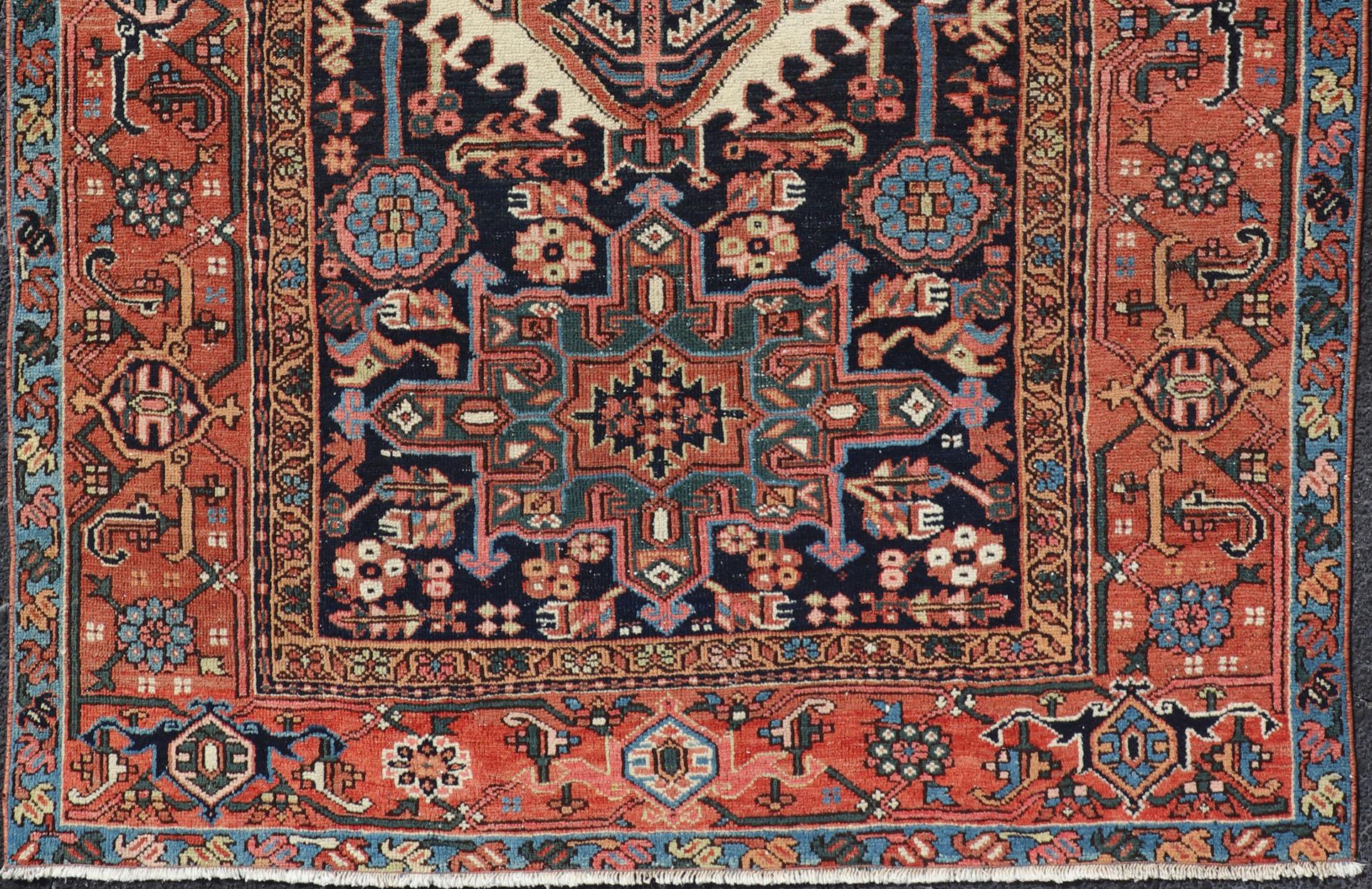 Antique Persian Heriz with Medallion Design in Ivory, Dark Blue & Jewel Tones In Good Condition For Sale In Atlanta, GA