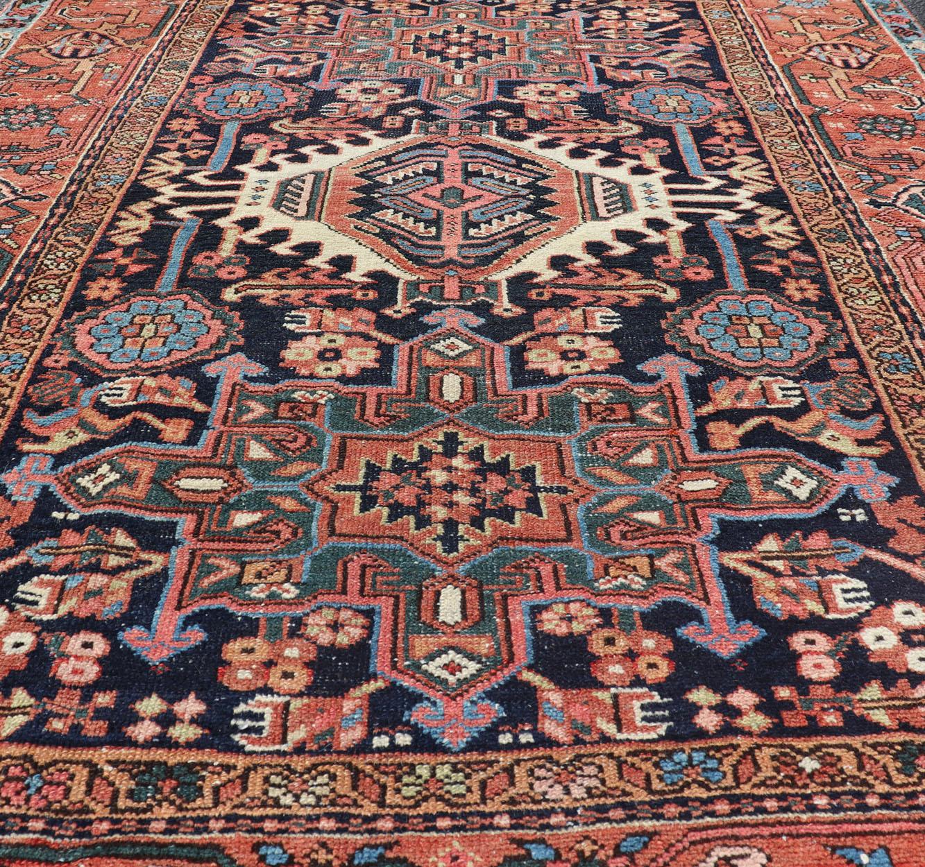 Wool Antique Persian Heriz with Medallion Design in Ivory, Dark Blue & Jewel Tones For Sale