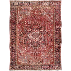 Antique Persian Heriz with Stylized Central Medallion 
Geometric-Floral Motifs