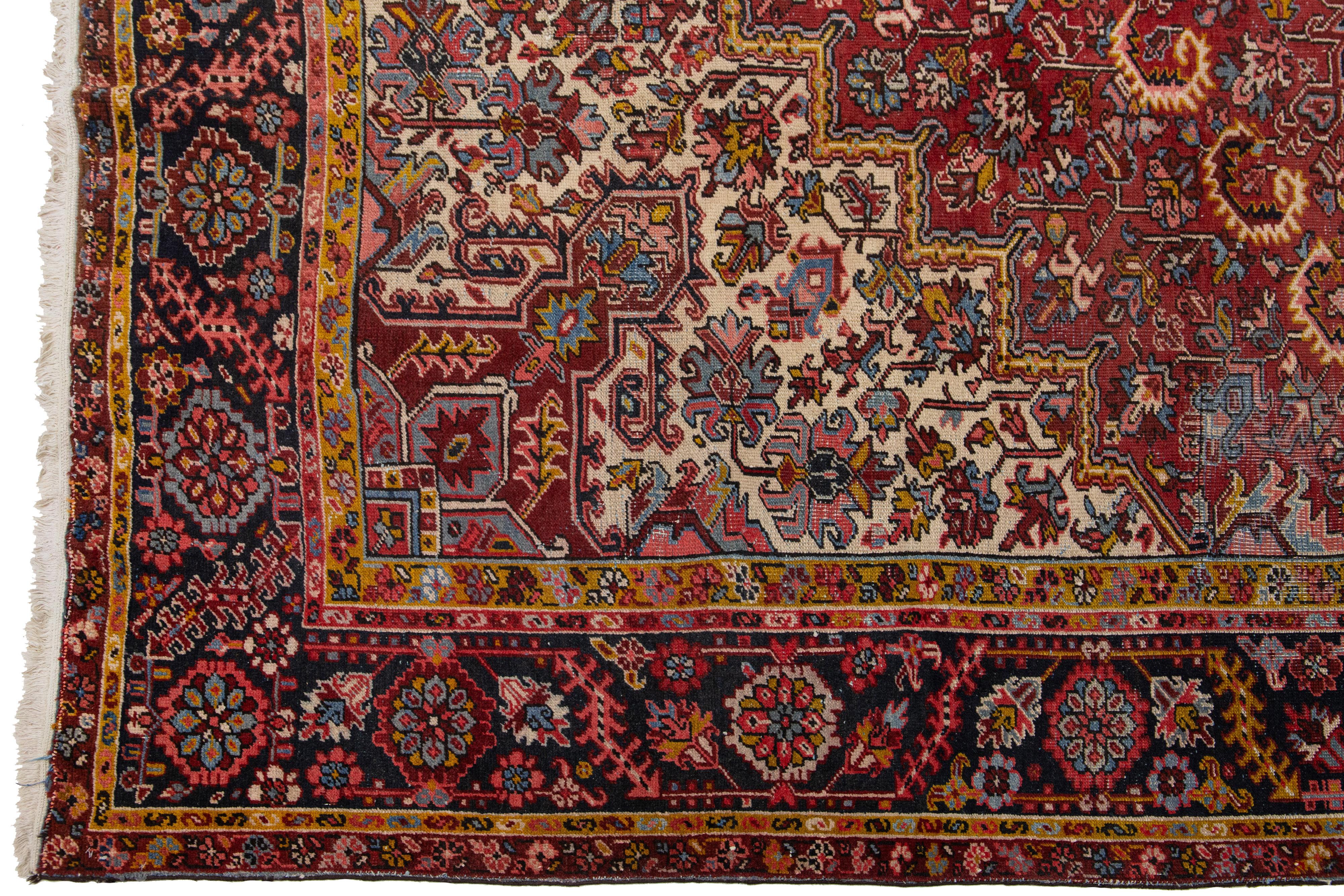 Antique Persian Heriz Wool Rug Featuring an Allover Motif In Red In Good Condition For Sale In Norwalk, CT