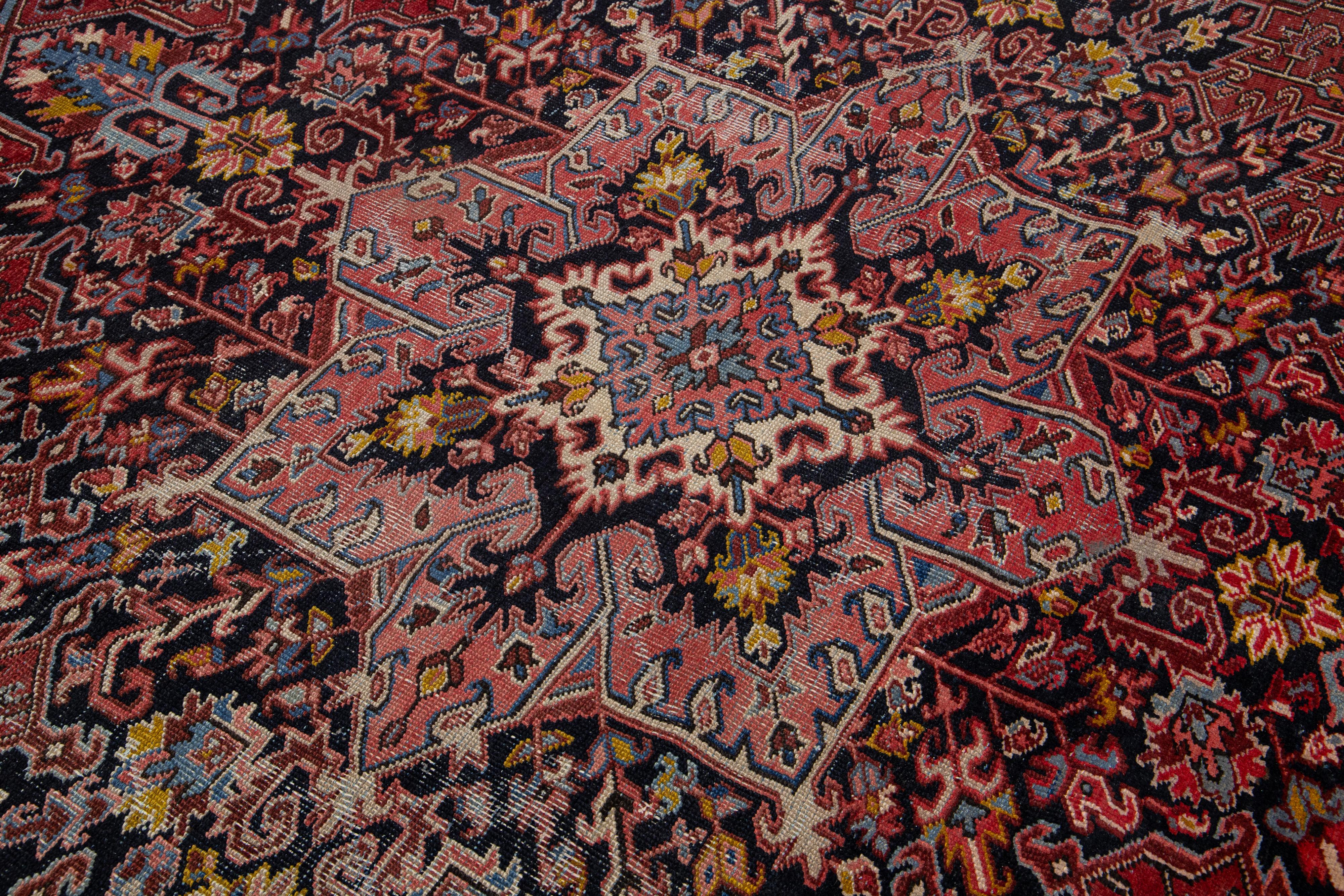 Antique Persian Heriz Wool Rug Featuring an Allover Motif In Red For Sale 1
