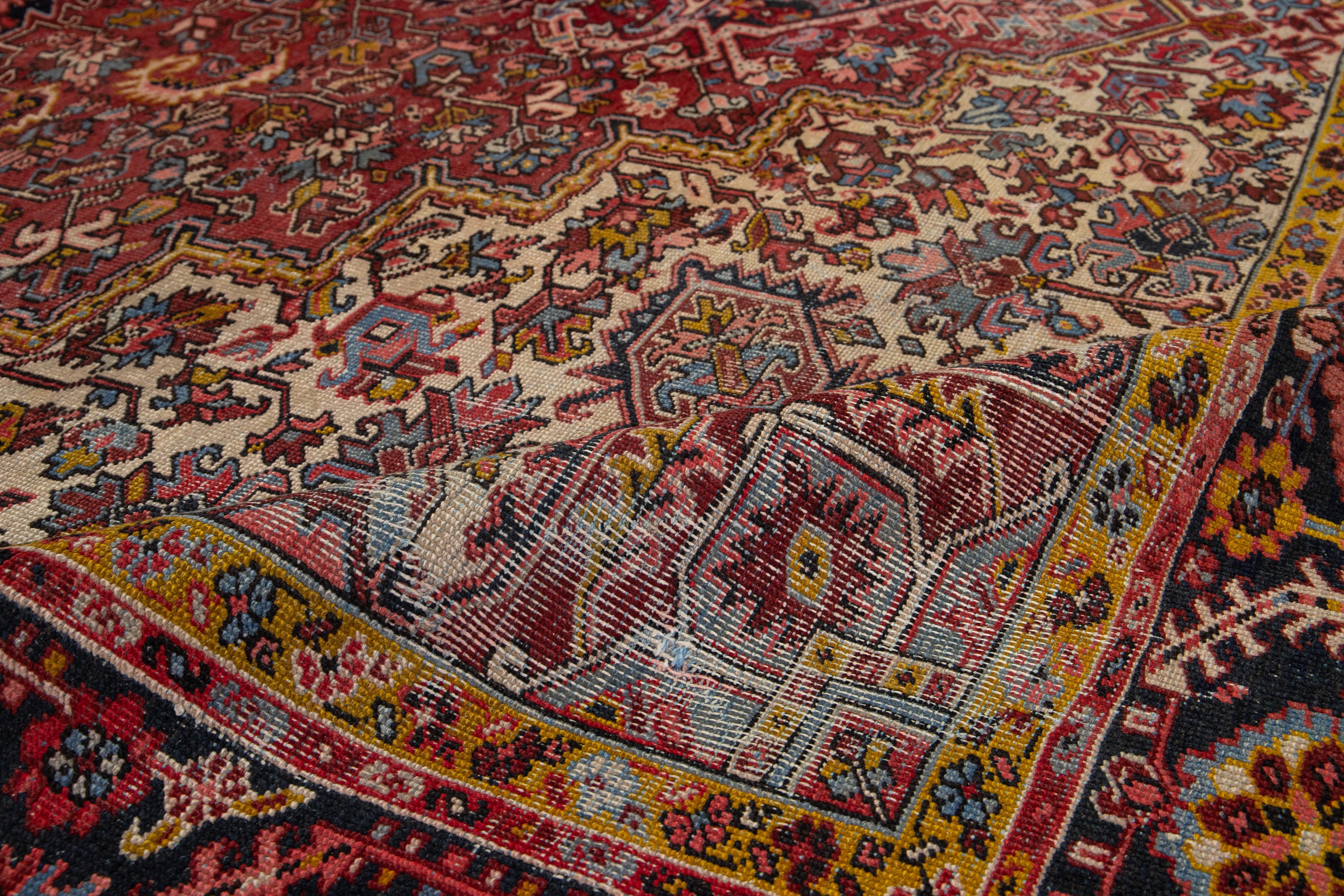 Antique Persian Heriz Wool Rug Featuring an Allover Motif In Red For Sale 2