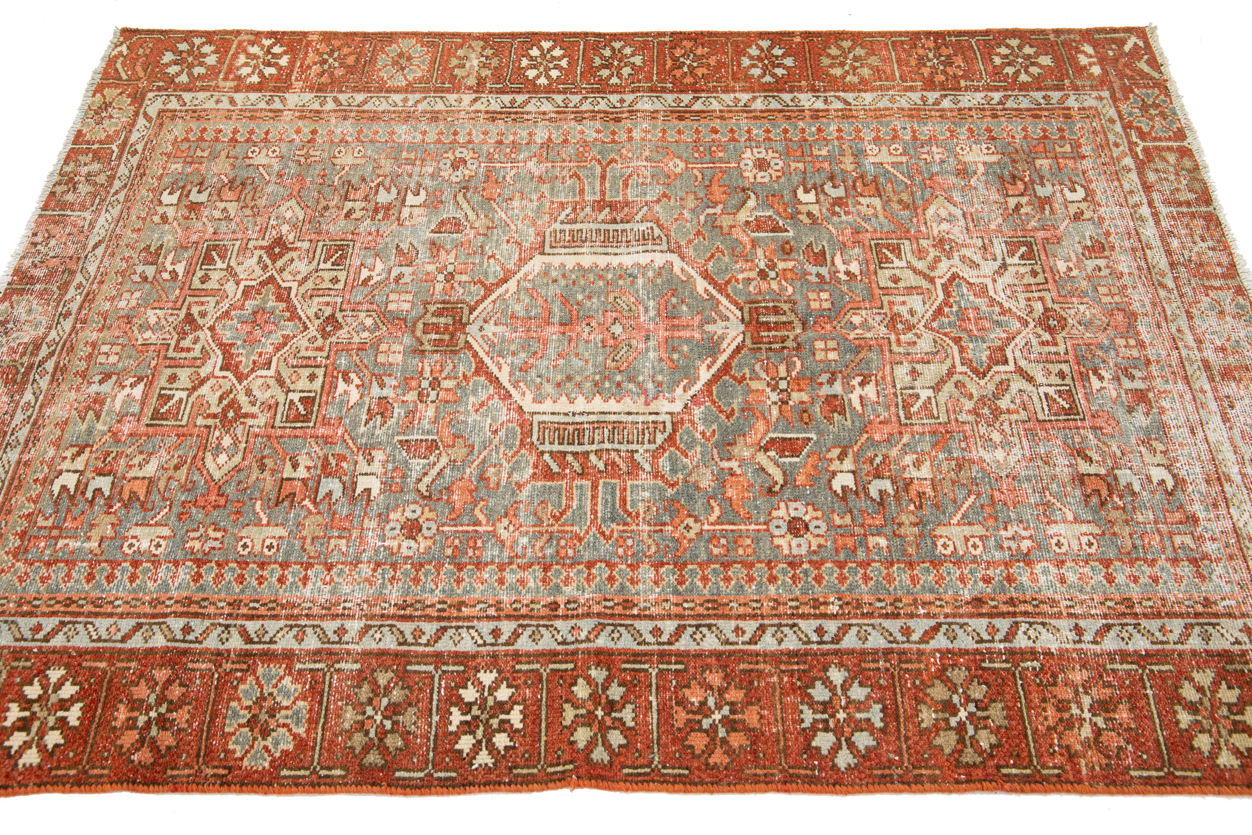 Antique Persian Heriz Wool Rug Featuring an Allover Motif In Rust For Sale 1
