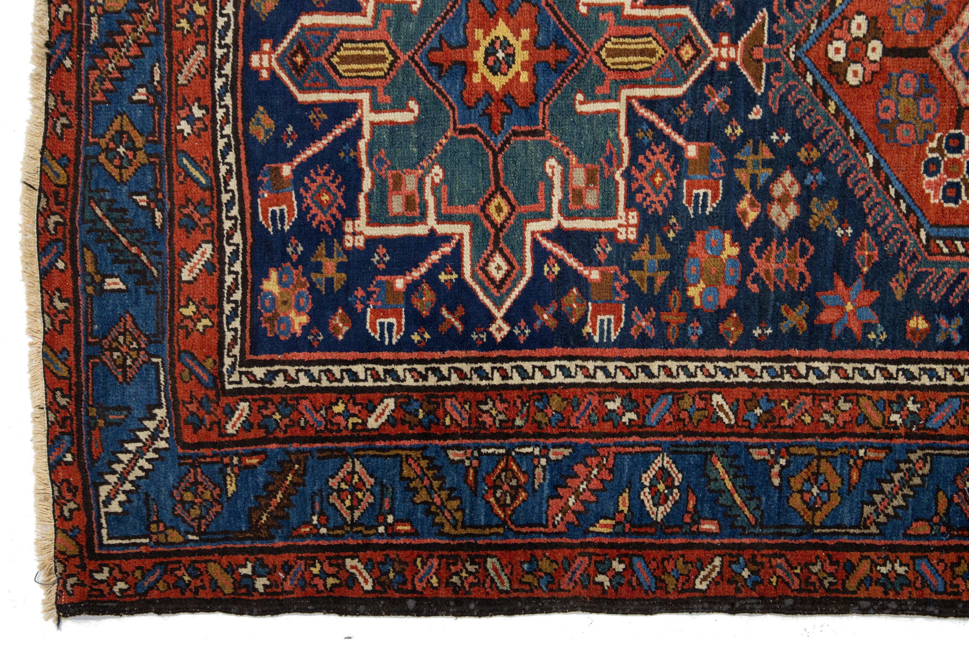 20th Century Antique Persian Heriz Wool Rug Handmade In Navy Blue With Tribal Design For Sale