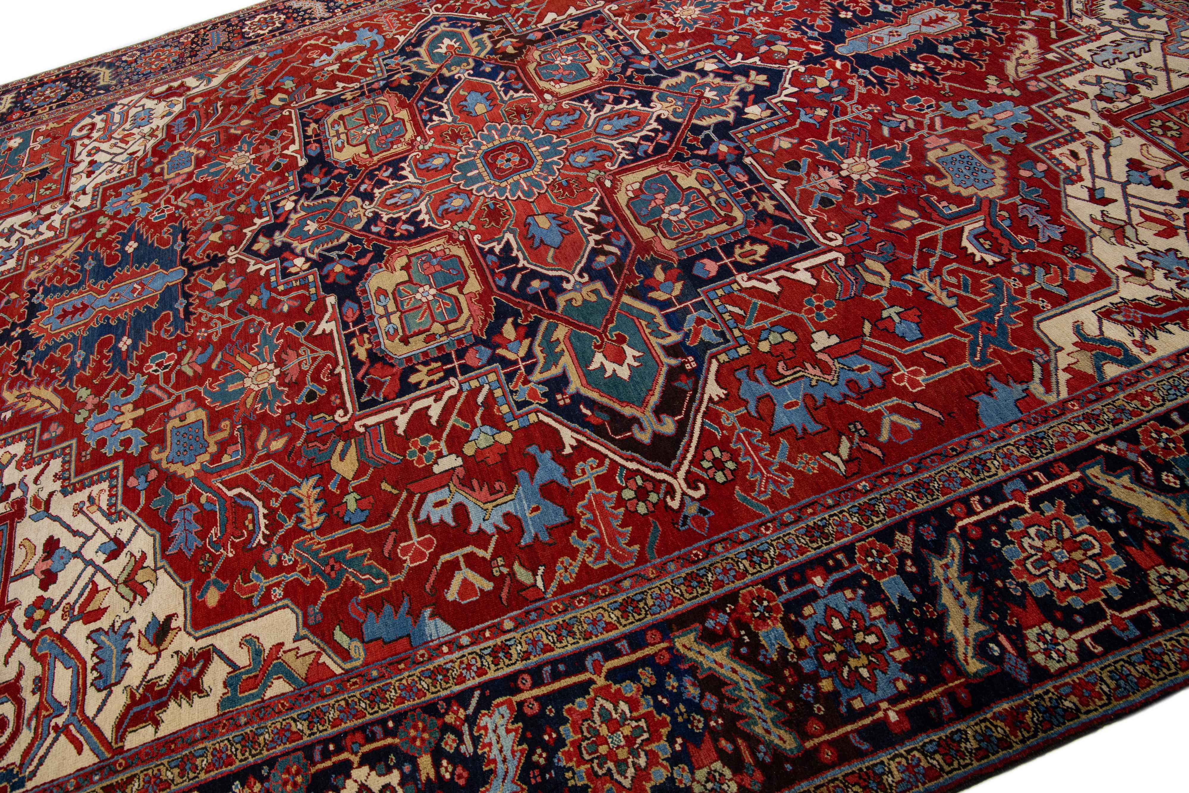 Heriz Serapi Antique Persian Heriz Wool Rug Handmade with Red Medallion Design For Sale
