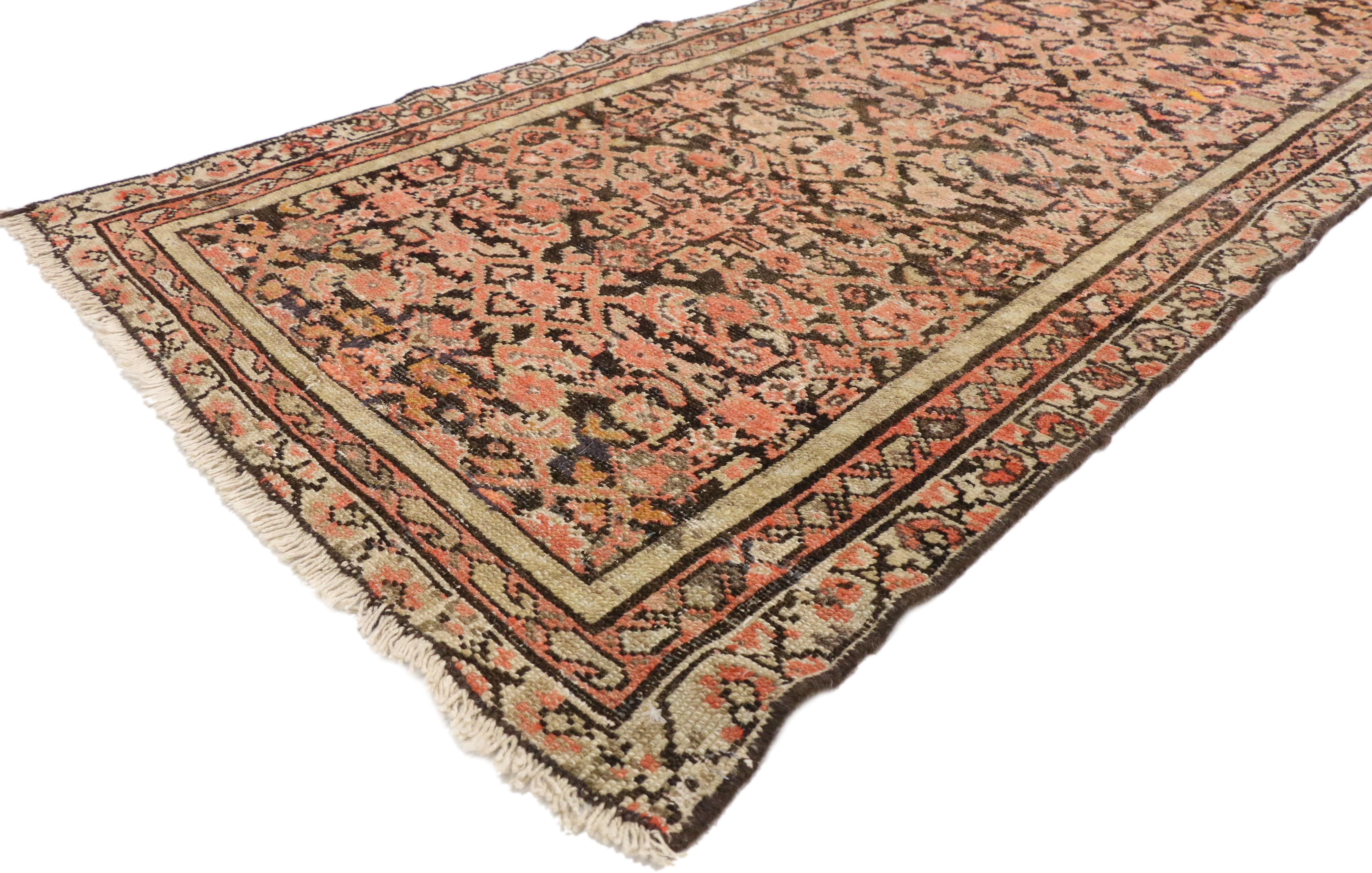 75342, antique Persian Hussainabad Hamadan runner, hallway runner. This hand knotted wool antique Persian Hussainabad Hamadan runner features a lively all-over Herati pattern that densely fills the field. A series of floral vine, boteh, and a
