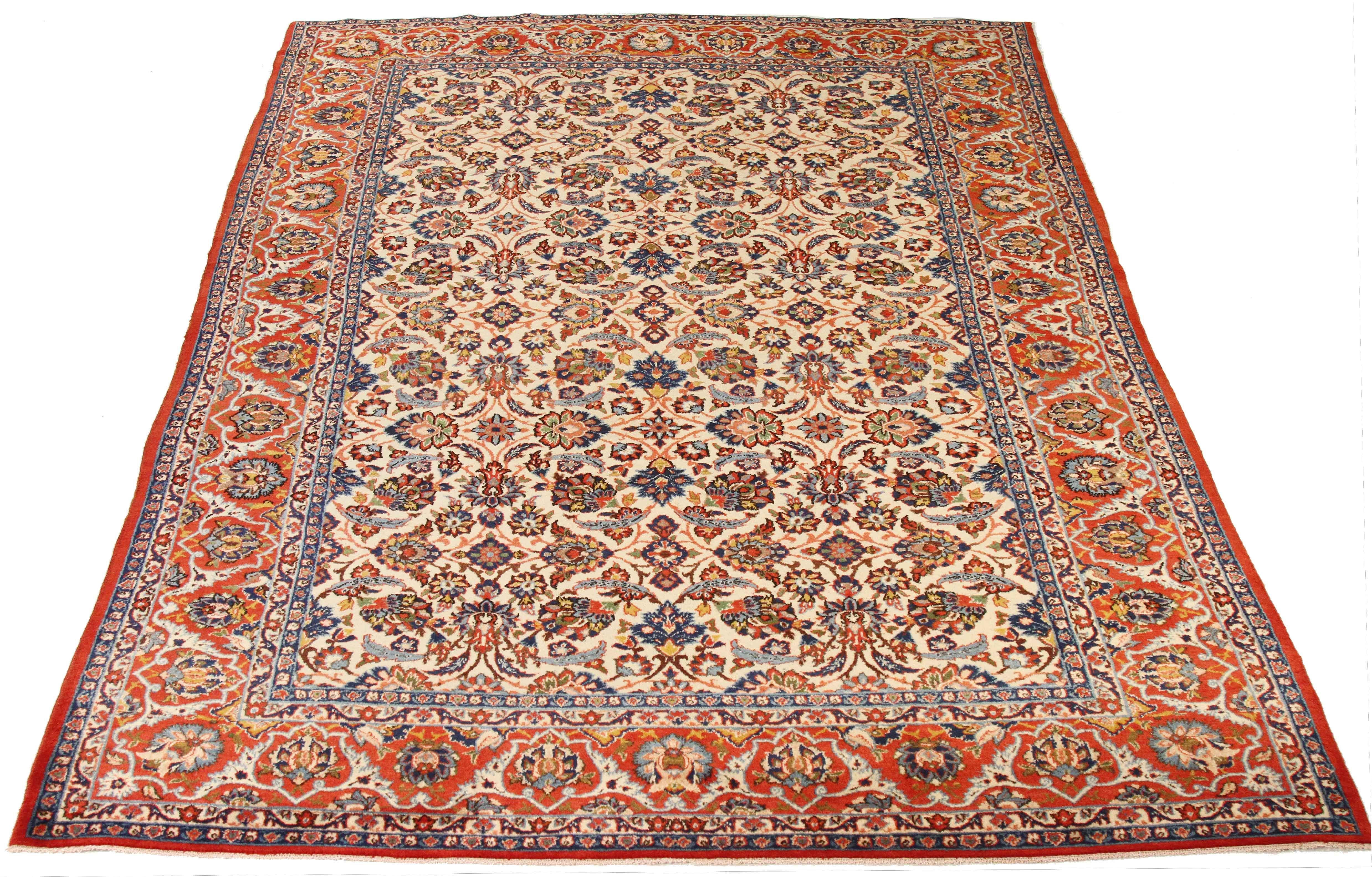 Antique Persian rug handwoven from the finest sheep’s wool and colored with all-natural vegetable dyes that are safe for humans and pets. It’s a traditional Isfahan design featuring colored floral details. It has an ivory center field with a navy