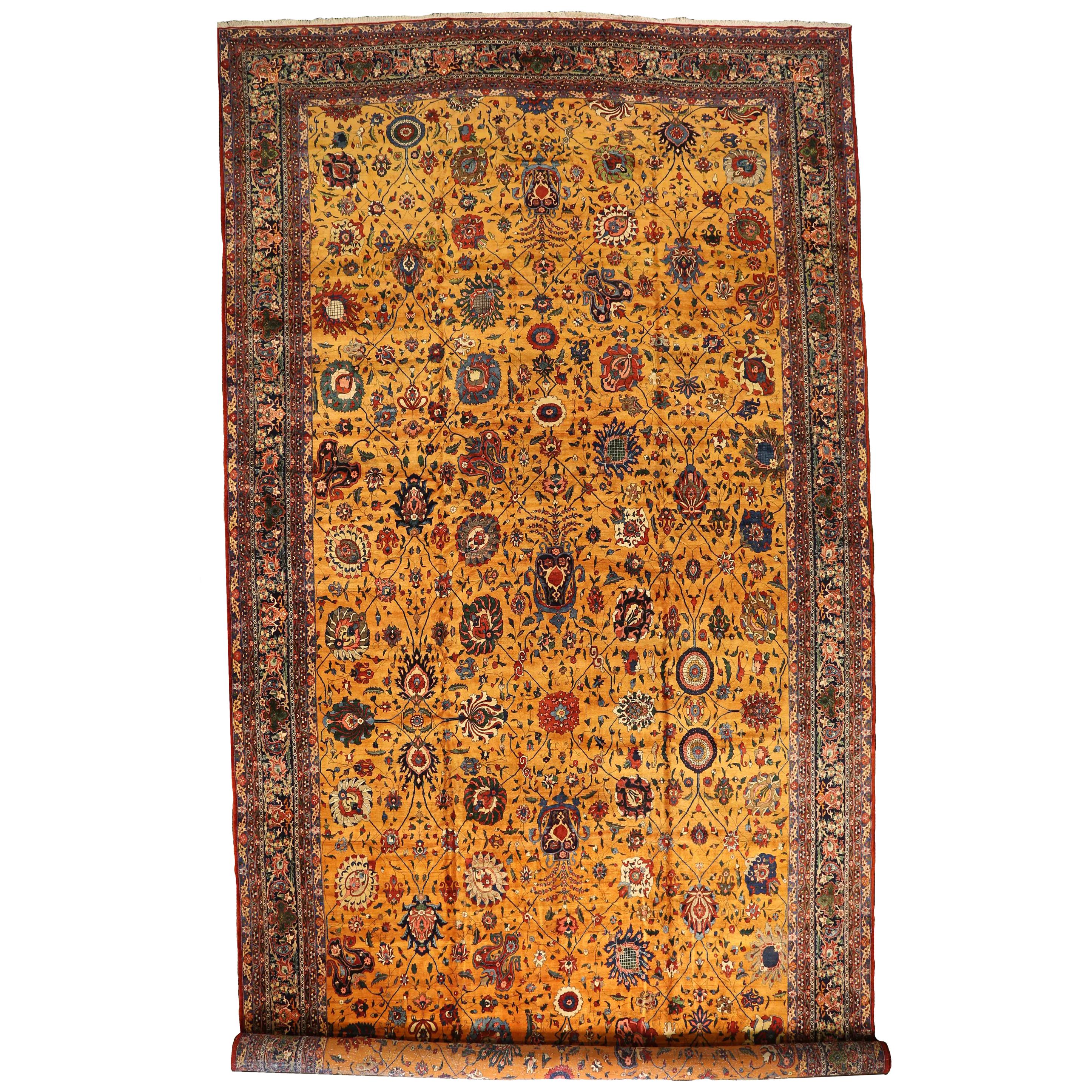 Antique Persian Isfahan Rug with Golden Field and Floral Details, circa 1910s