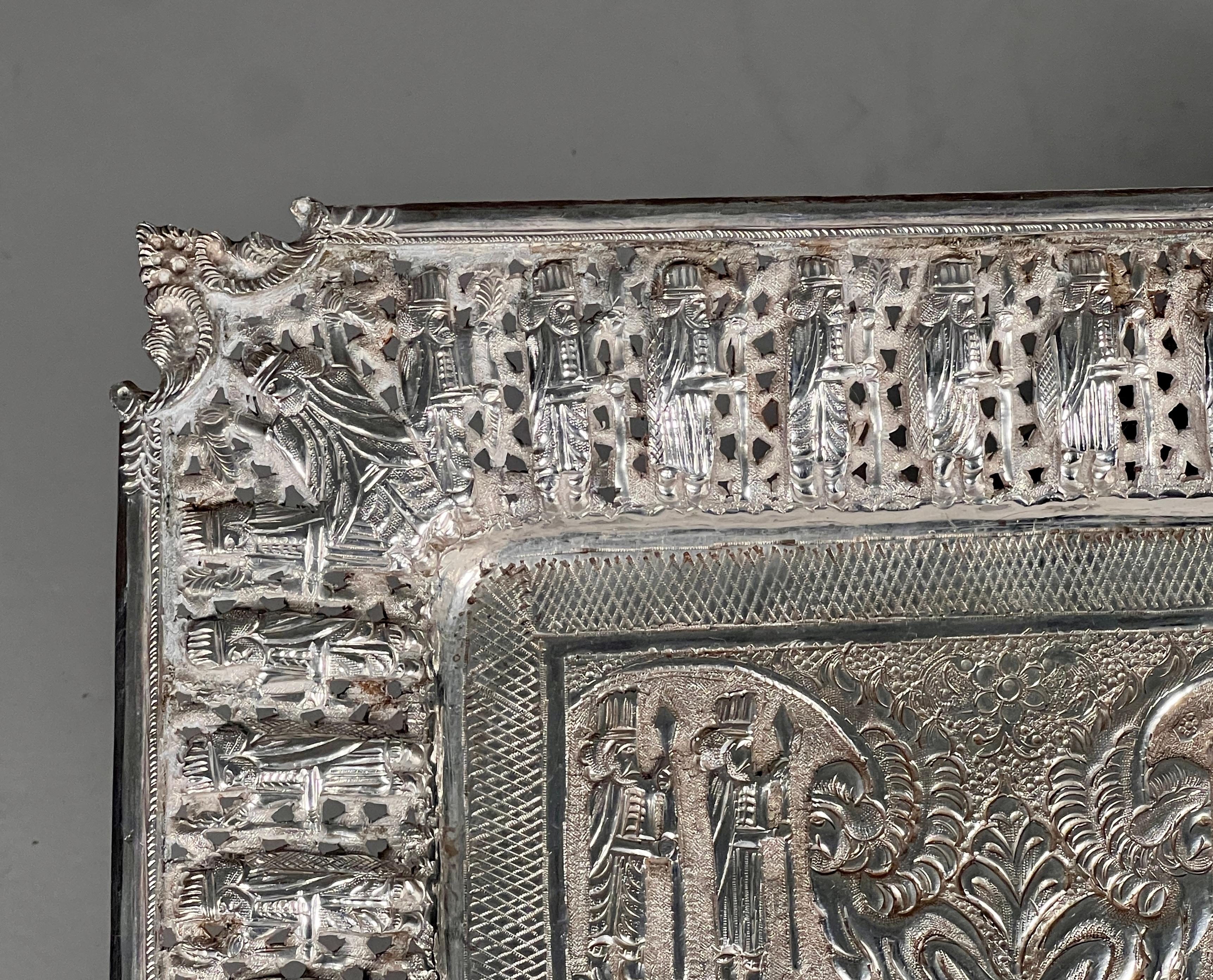 A mid 20th century Persian Isfahan solid silver / wall plaque or tray of rectangular form. This is a stunning piece of artwork. The tray also features the artist's name, which adds a personal touch and showcases their craftsmanship.

One of the most