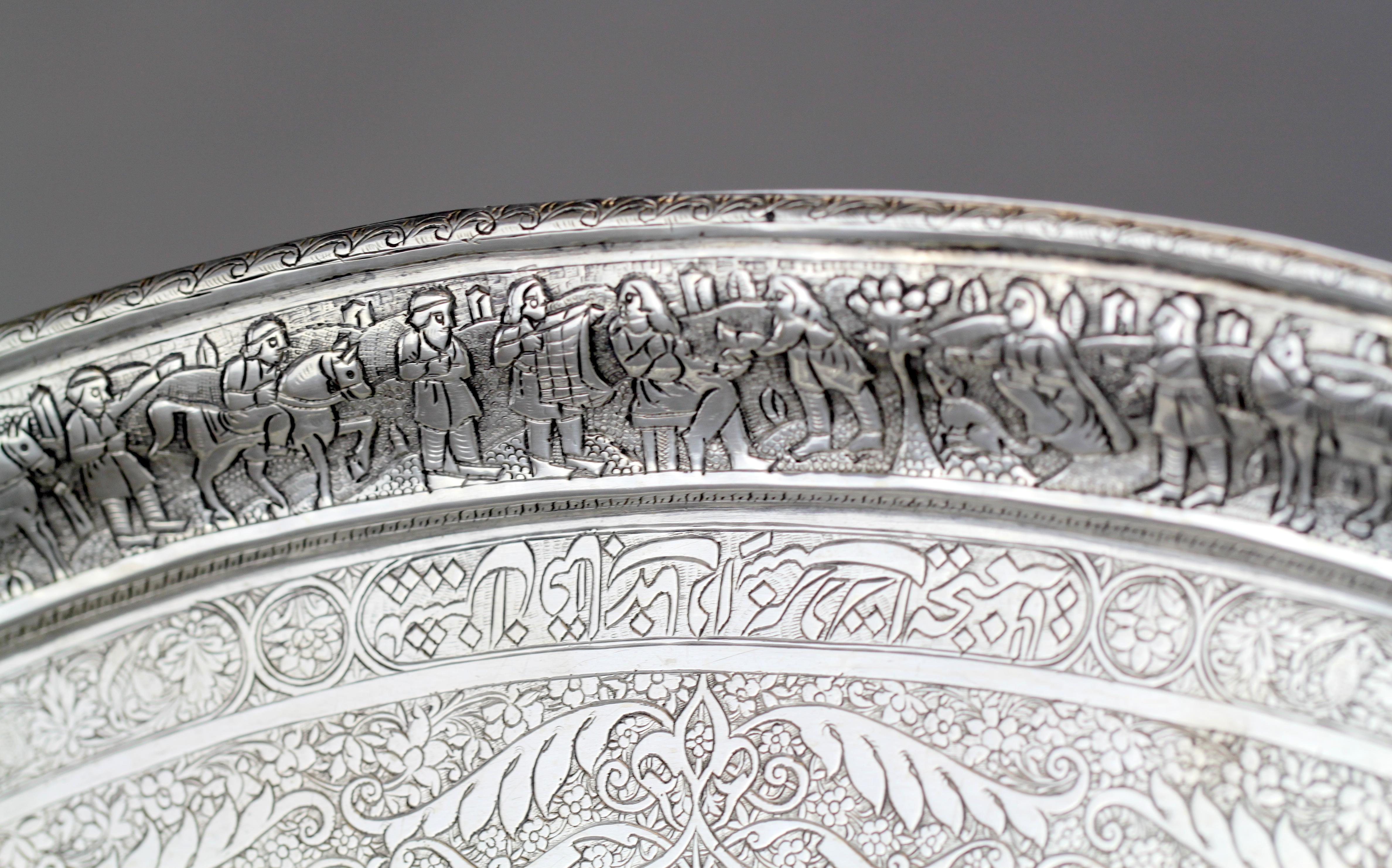 Antique Persian / Islamic silver tray,
circa late 19th century.
Maker: Unidentified.
Fully hallmarked
875 / 1000 silver. 

Dimensions: 
Size: 35.5 x 23.8 x 2 cm 
Weight: 514 grams .

Condition: Tray has some general usage wear and tear