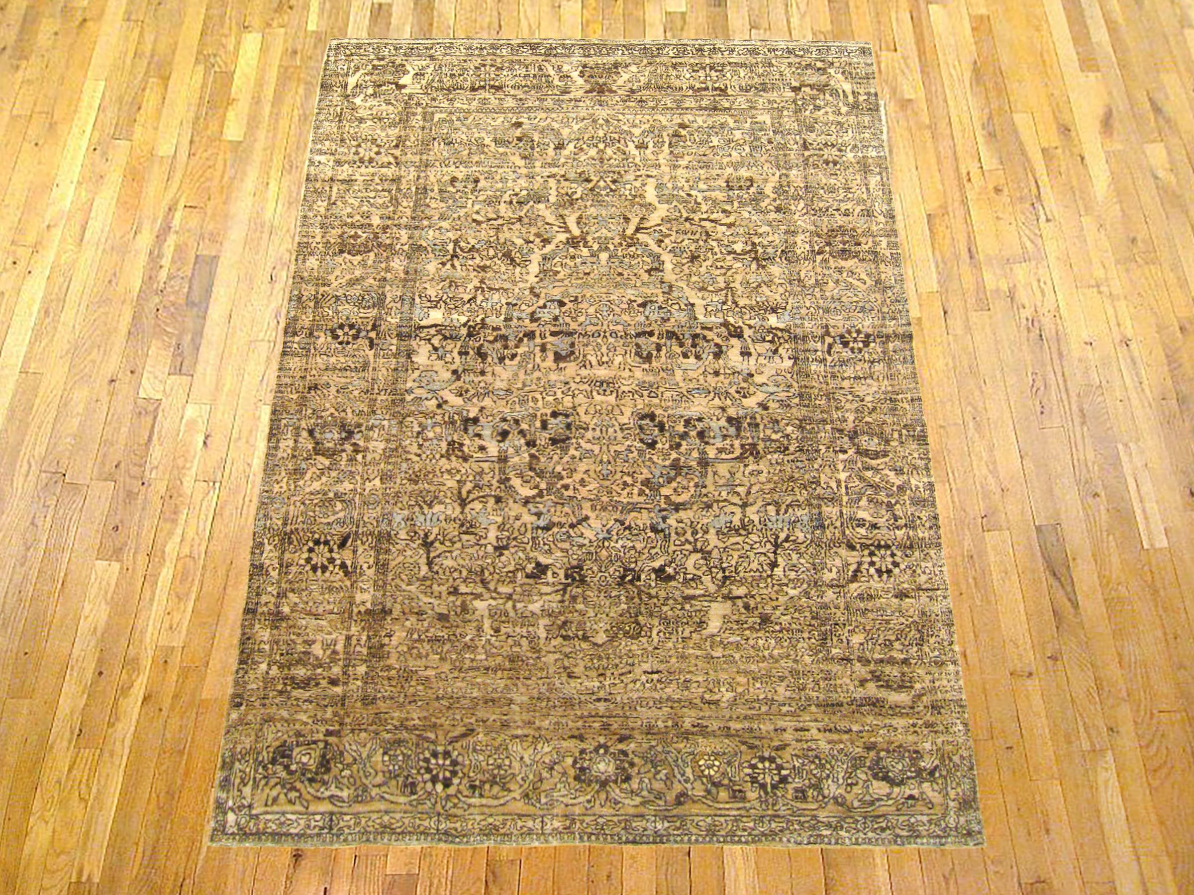 Antique Persian Isphahan rug, small size, circa 1920.

A one-of-a-kind antique Persian Isphahan Oriental Carpet, hand-knotted with soft wool pile. This lovely hand-knotted wool rug features floral elements allover the ivory field, within an ivory