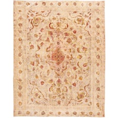 Antiker persischer elfenbeinfarbener Kerman-Teppich